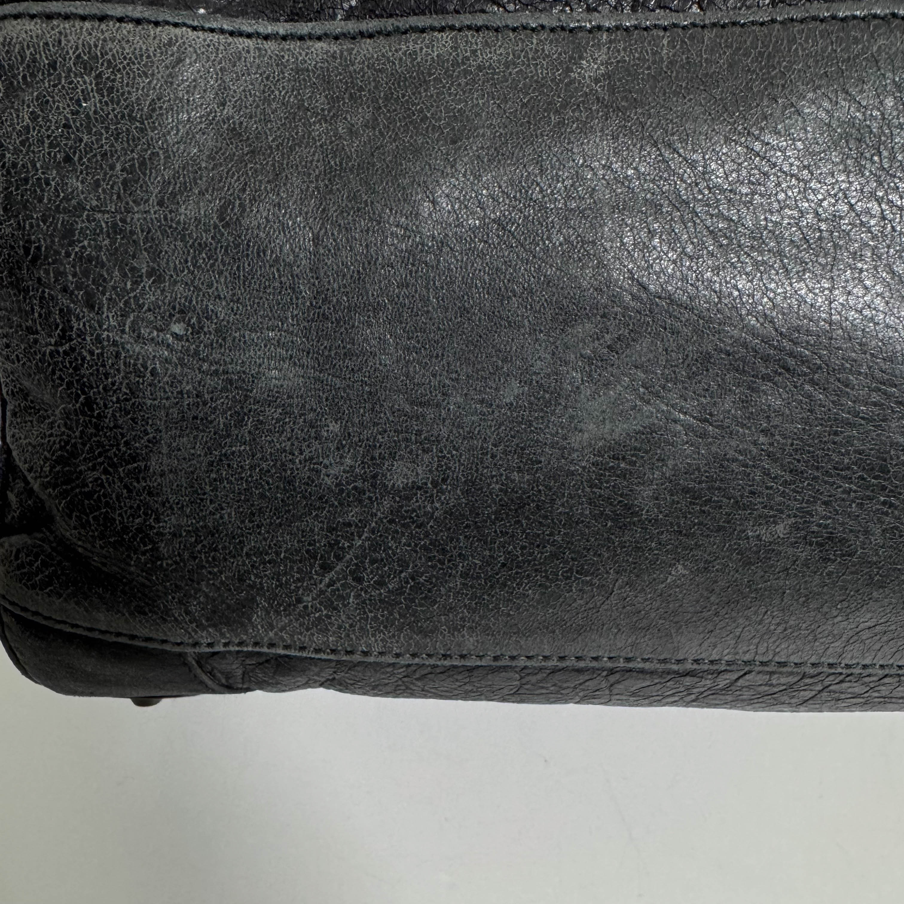 The First Black Leather Hand Bag