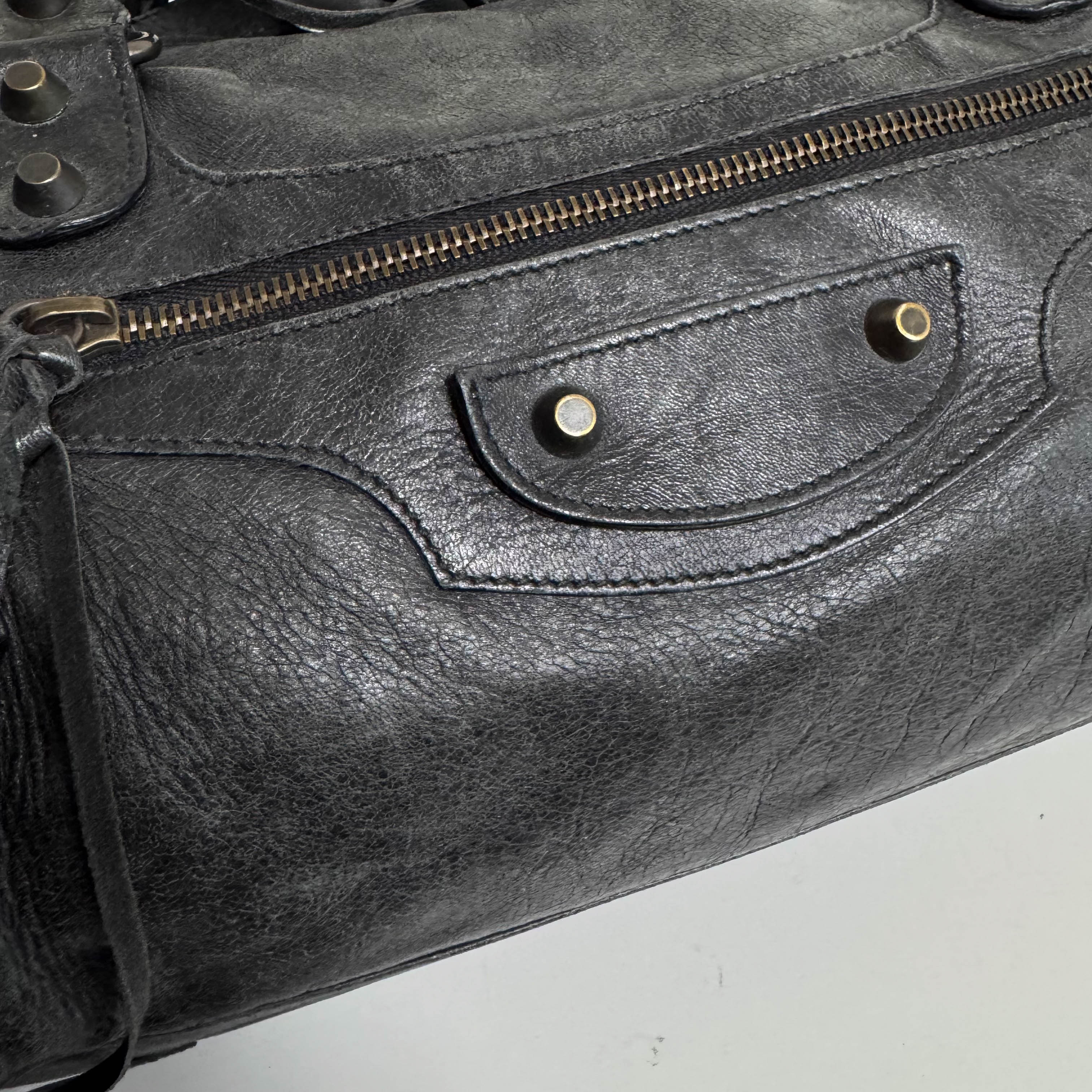The First Black Leather Hand Bag