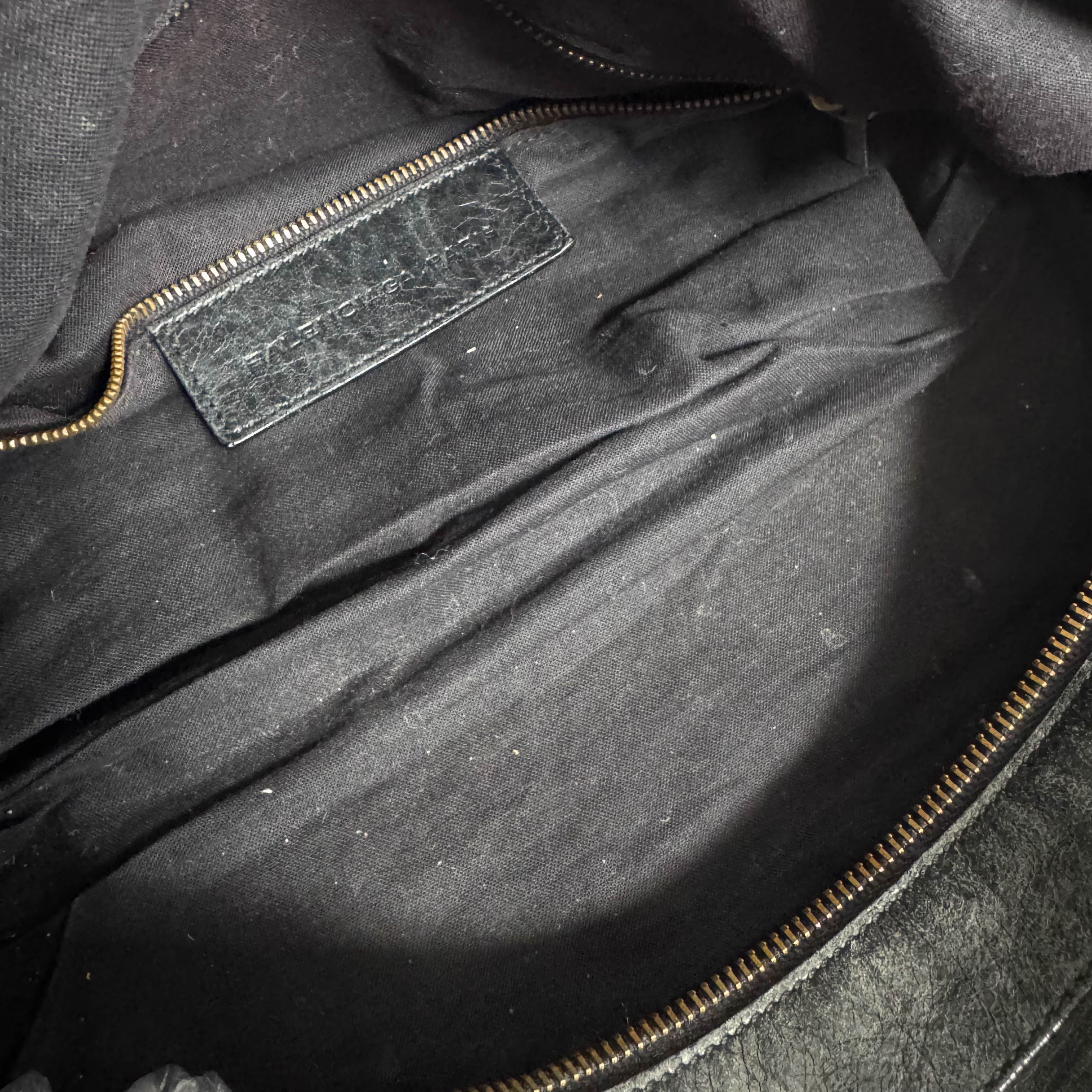 The First Black Leather Hand Bag