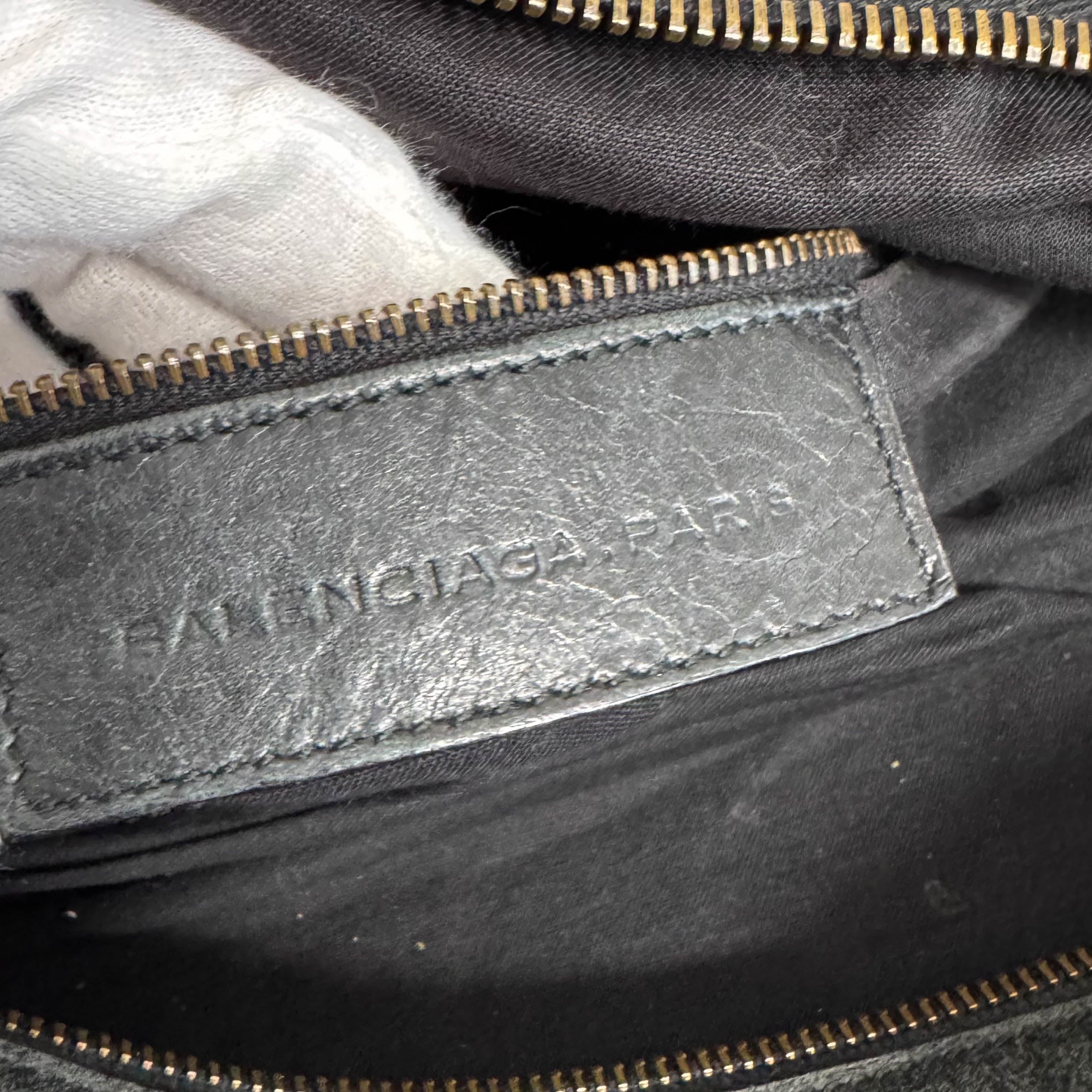 The First Black Leather Hand Bag