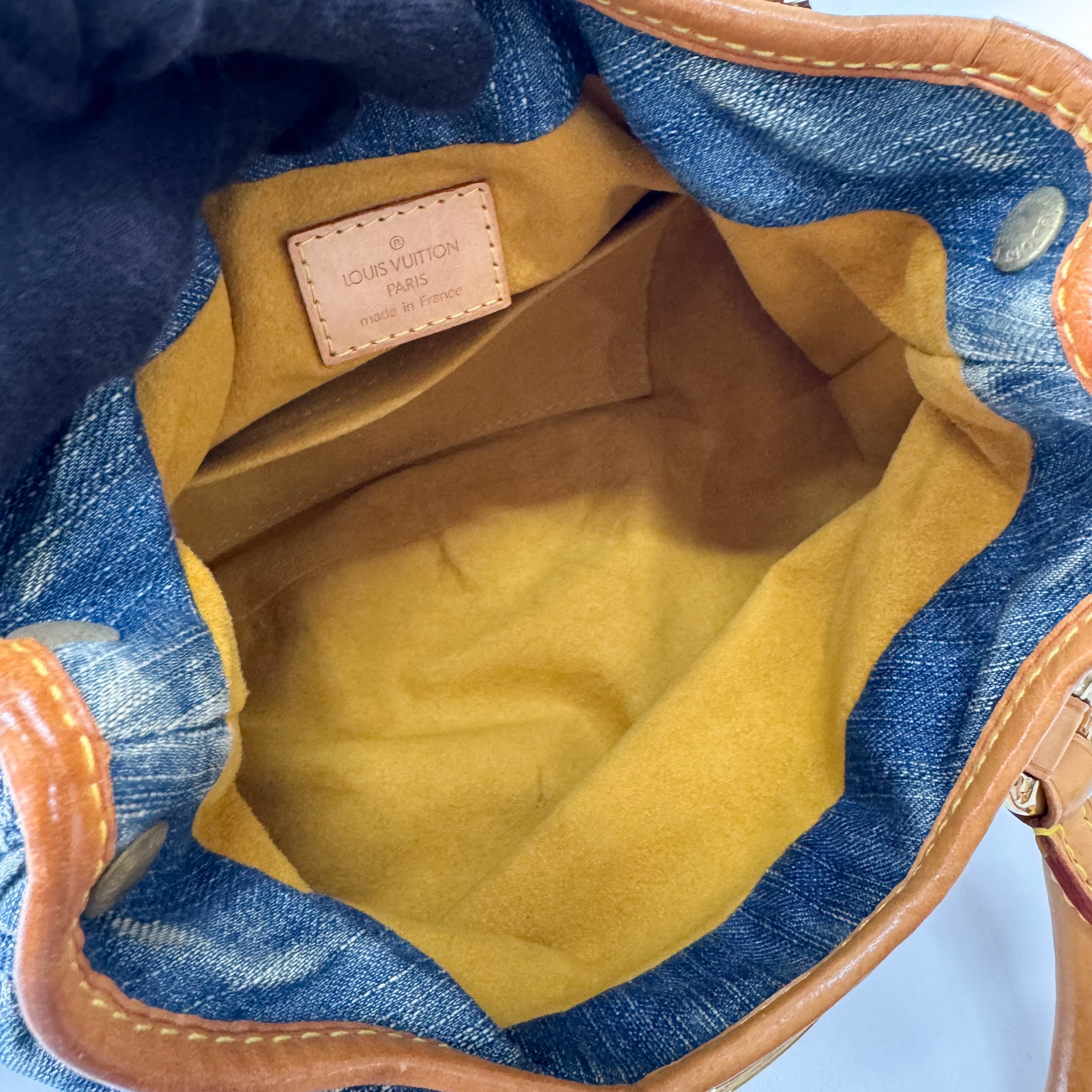 Pleaty Blue Denim Monogram Bag