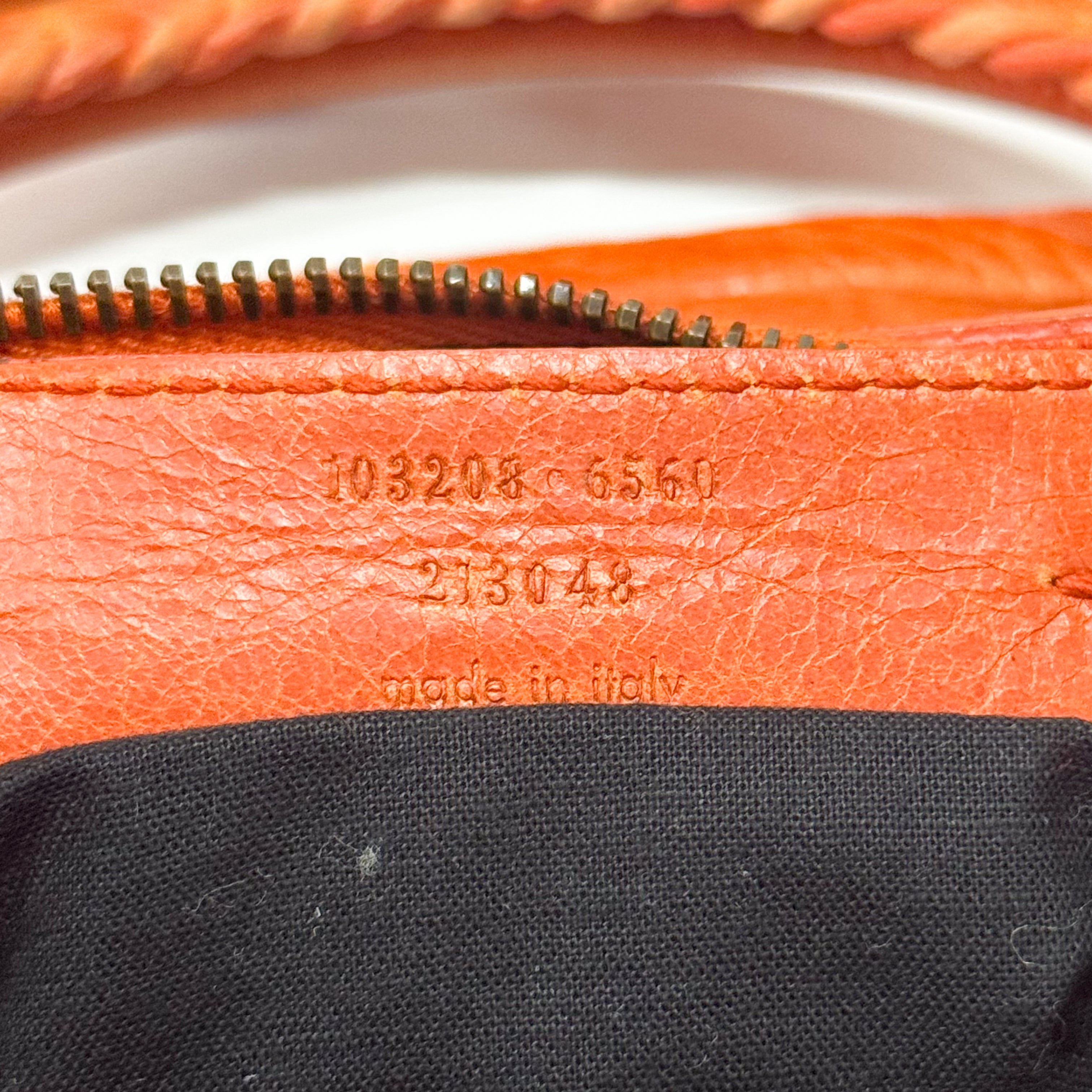 The First Orange Leather Two Way Bag