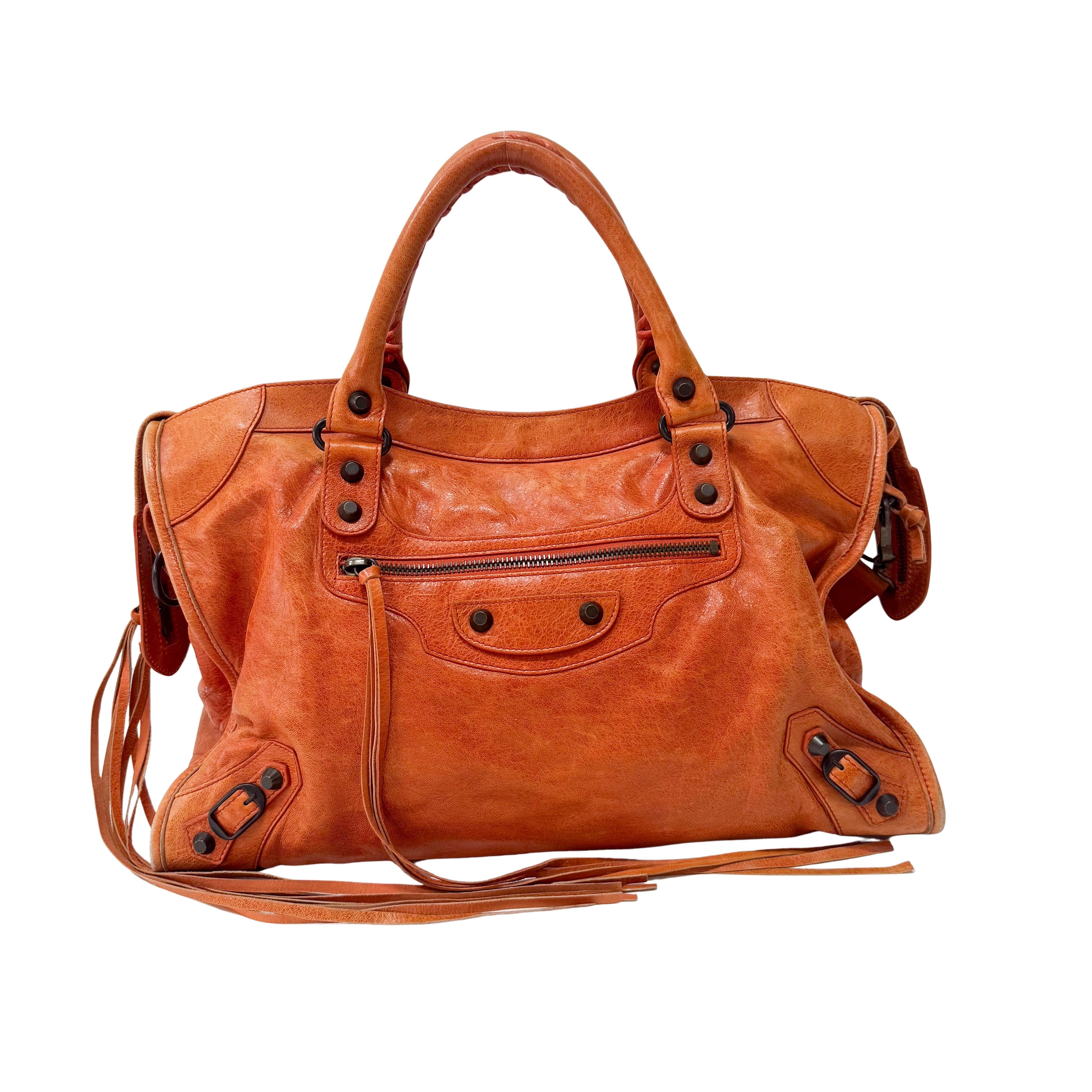 The City Orange Leather Hand bag