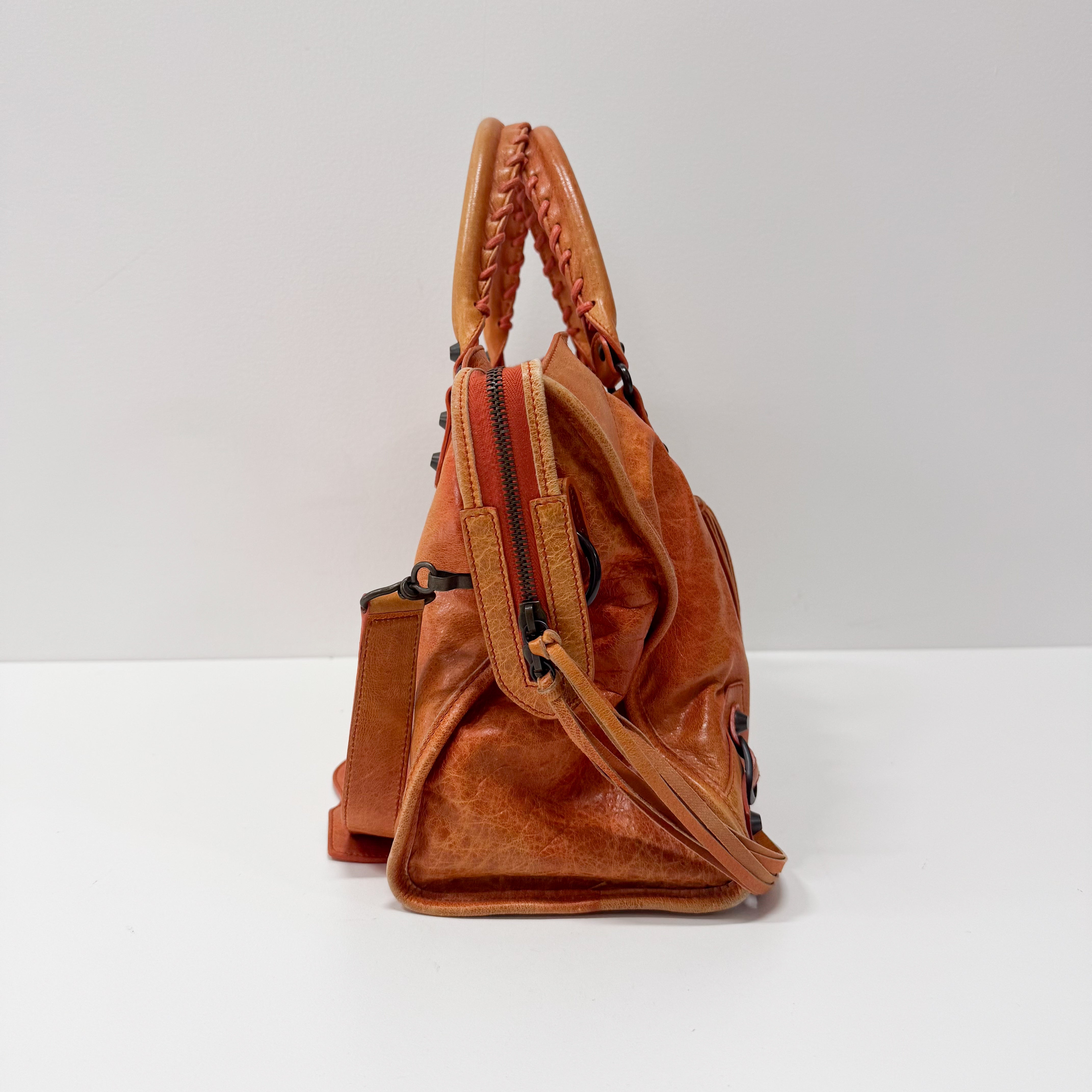 The City Orange Leather Hand bag