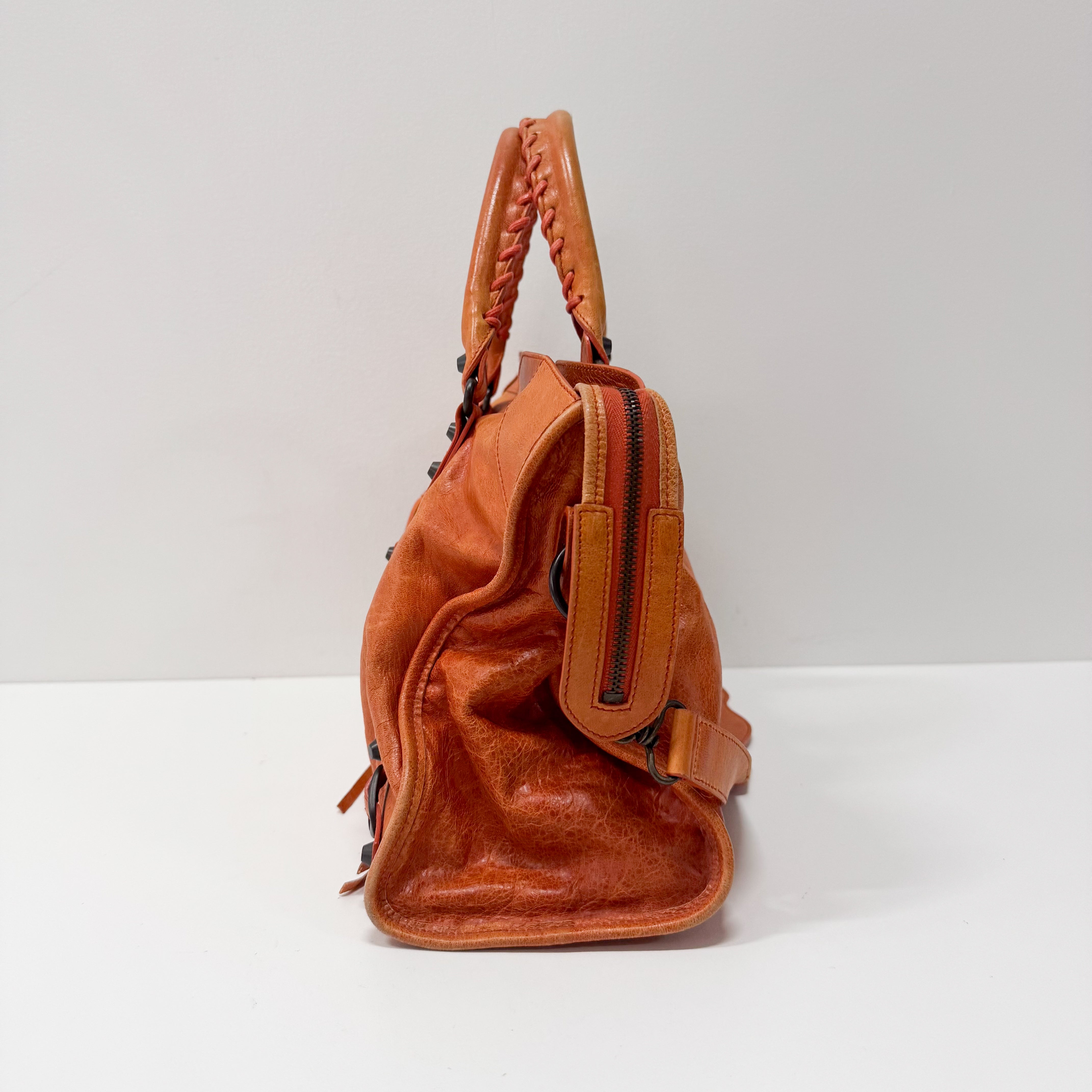 The City Orange Leather Hand bag