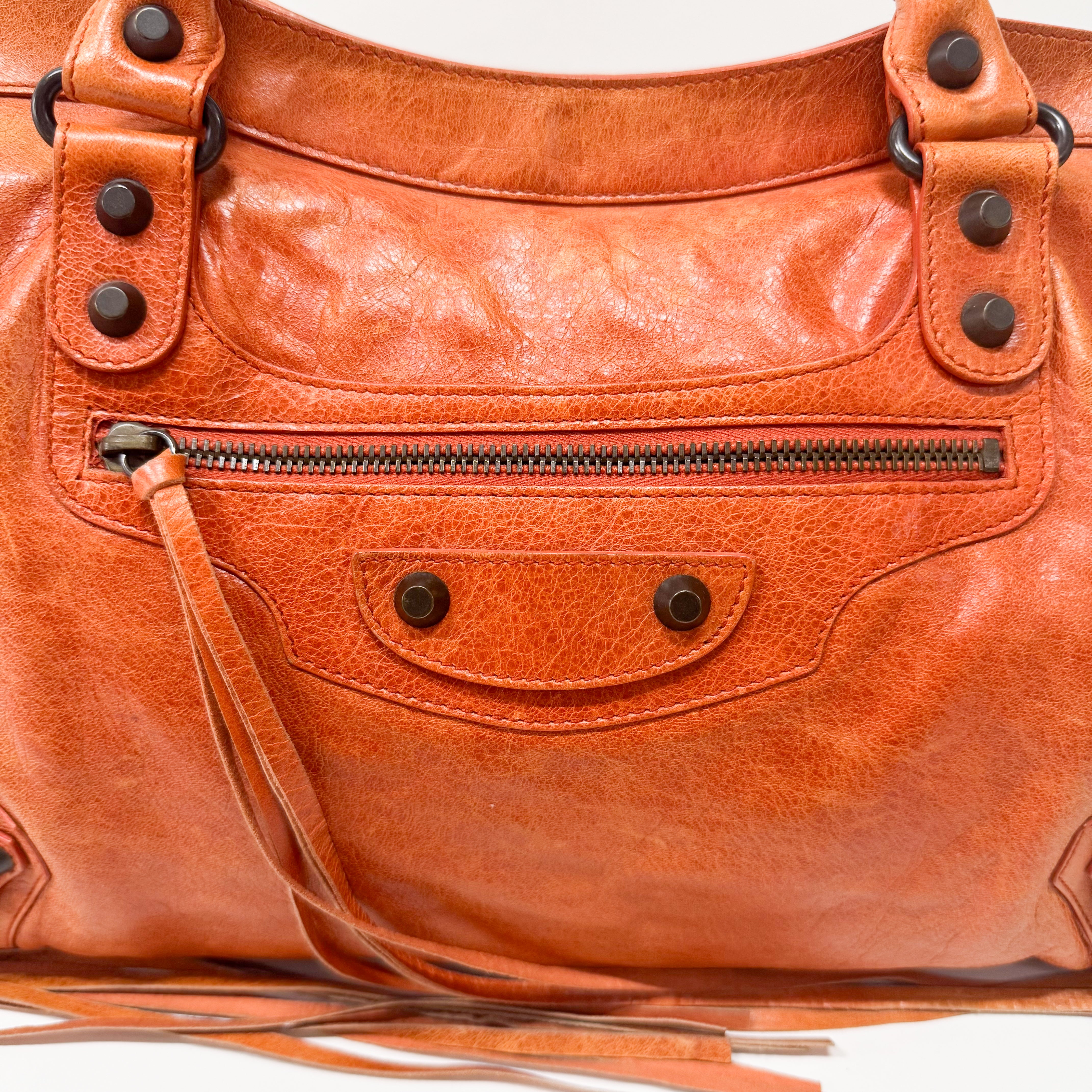 The City Orange Leather Hand bag