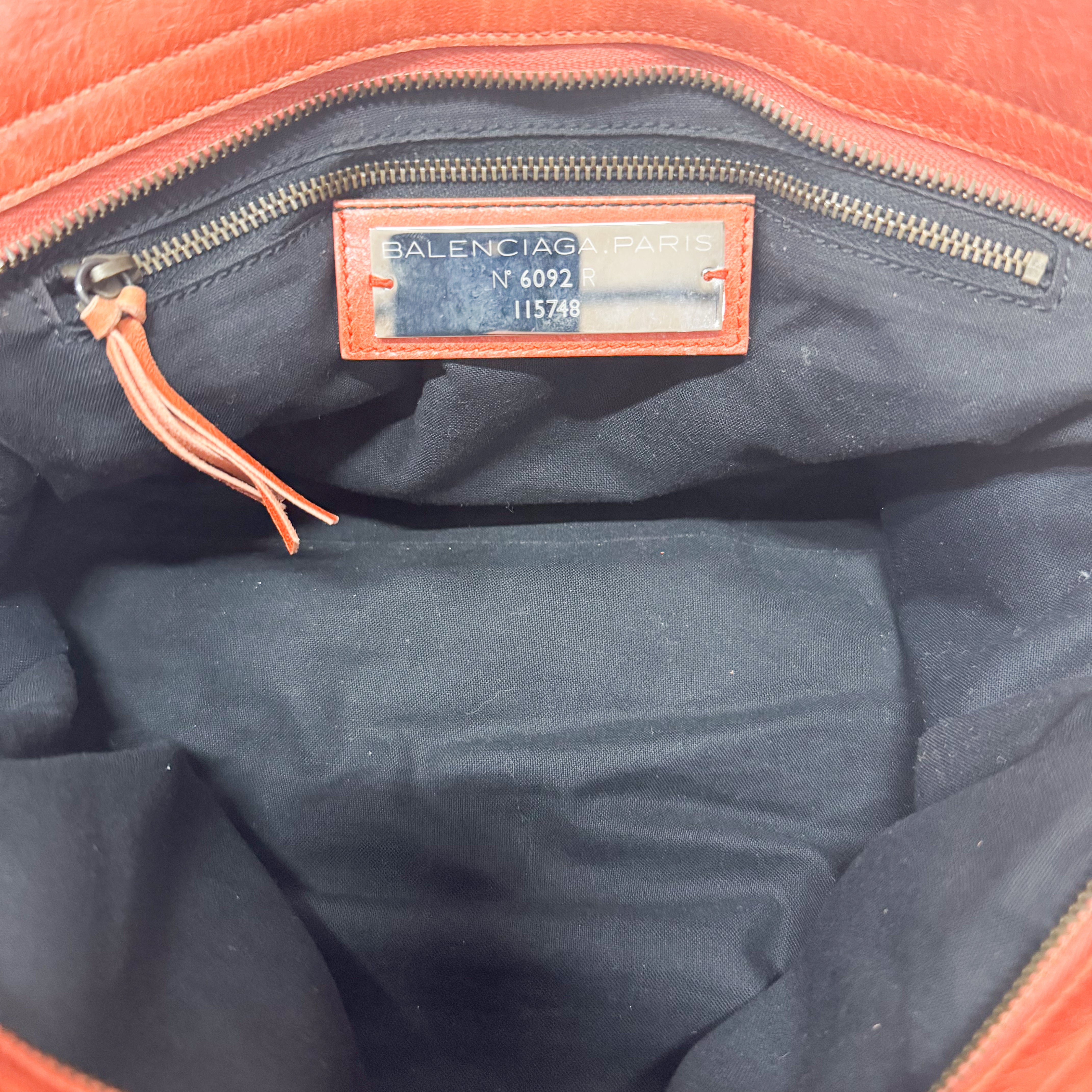 The City Orange Leather Hand bag