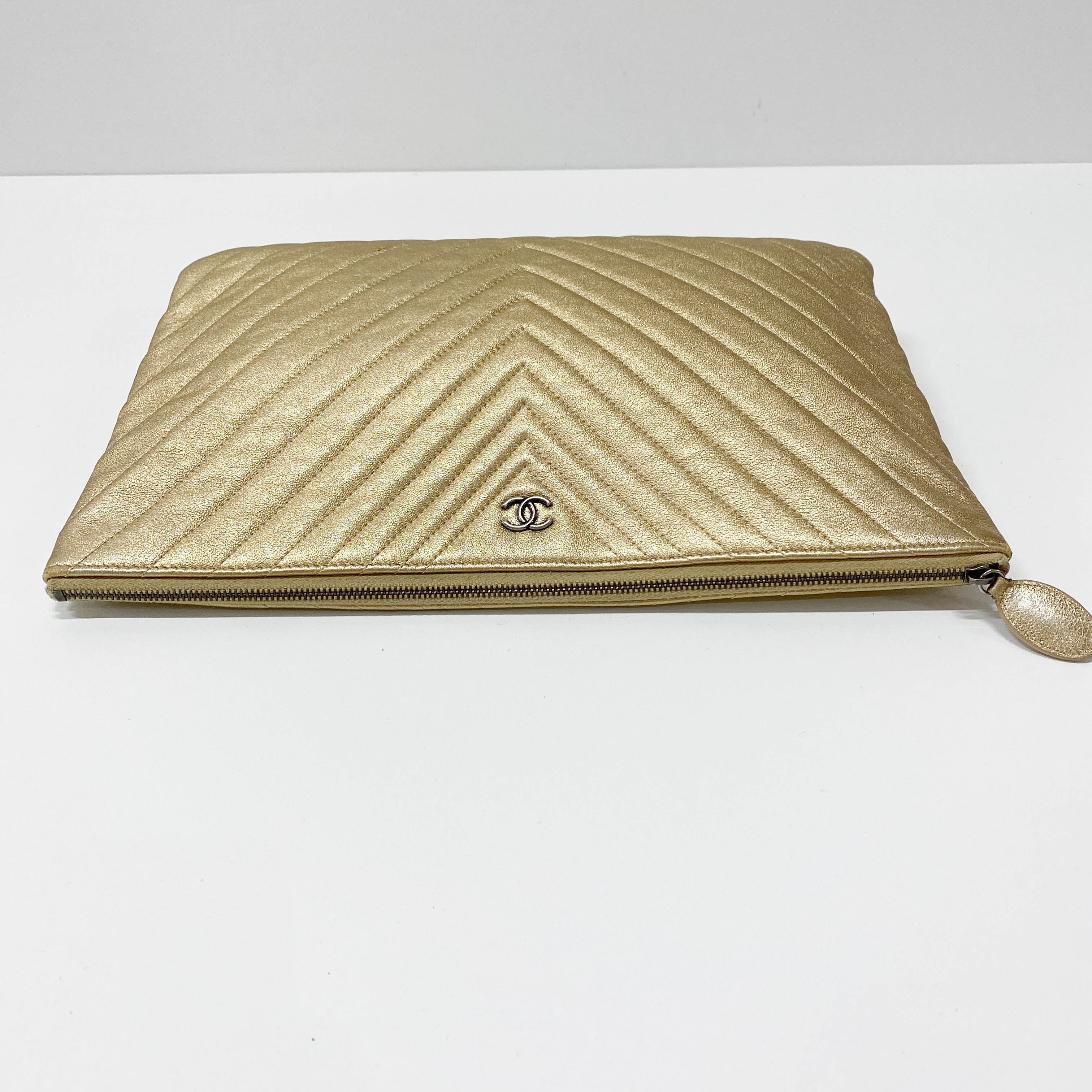 Gold Chevron V Stitch Leather Clutch Bag