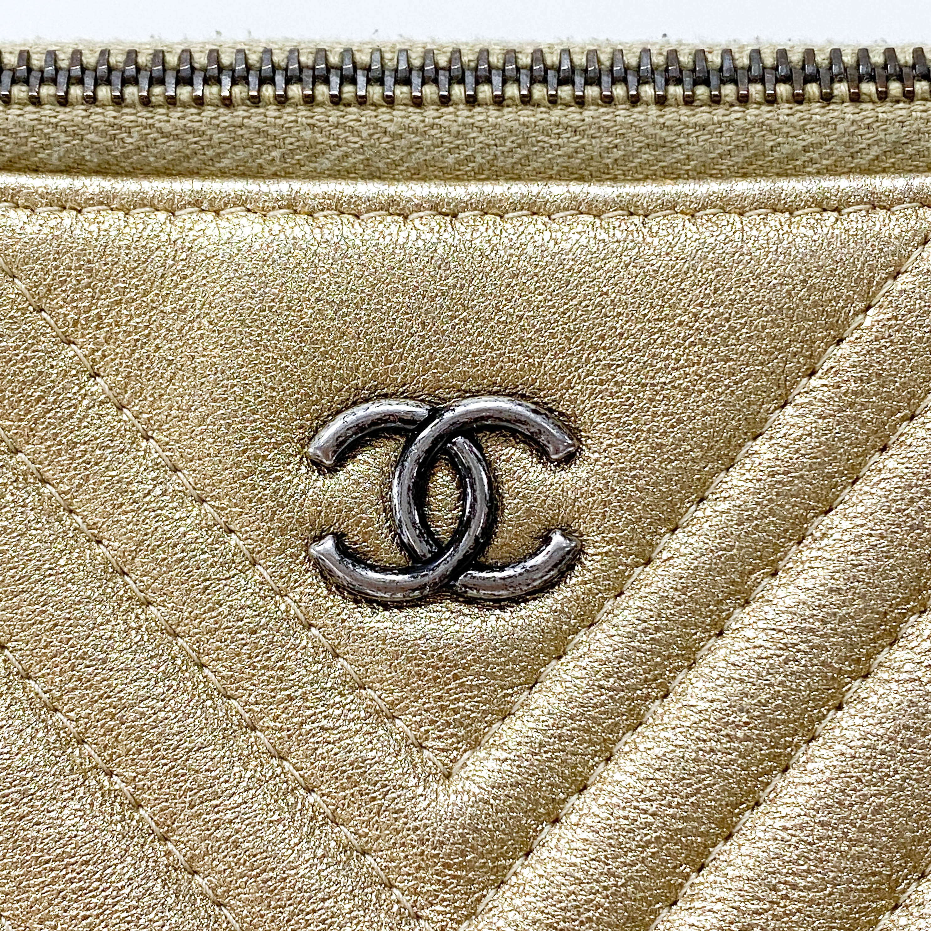 Gold Chevron V Stitch Leather Clutch Bag