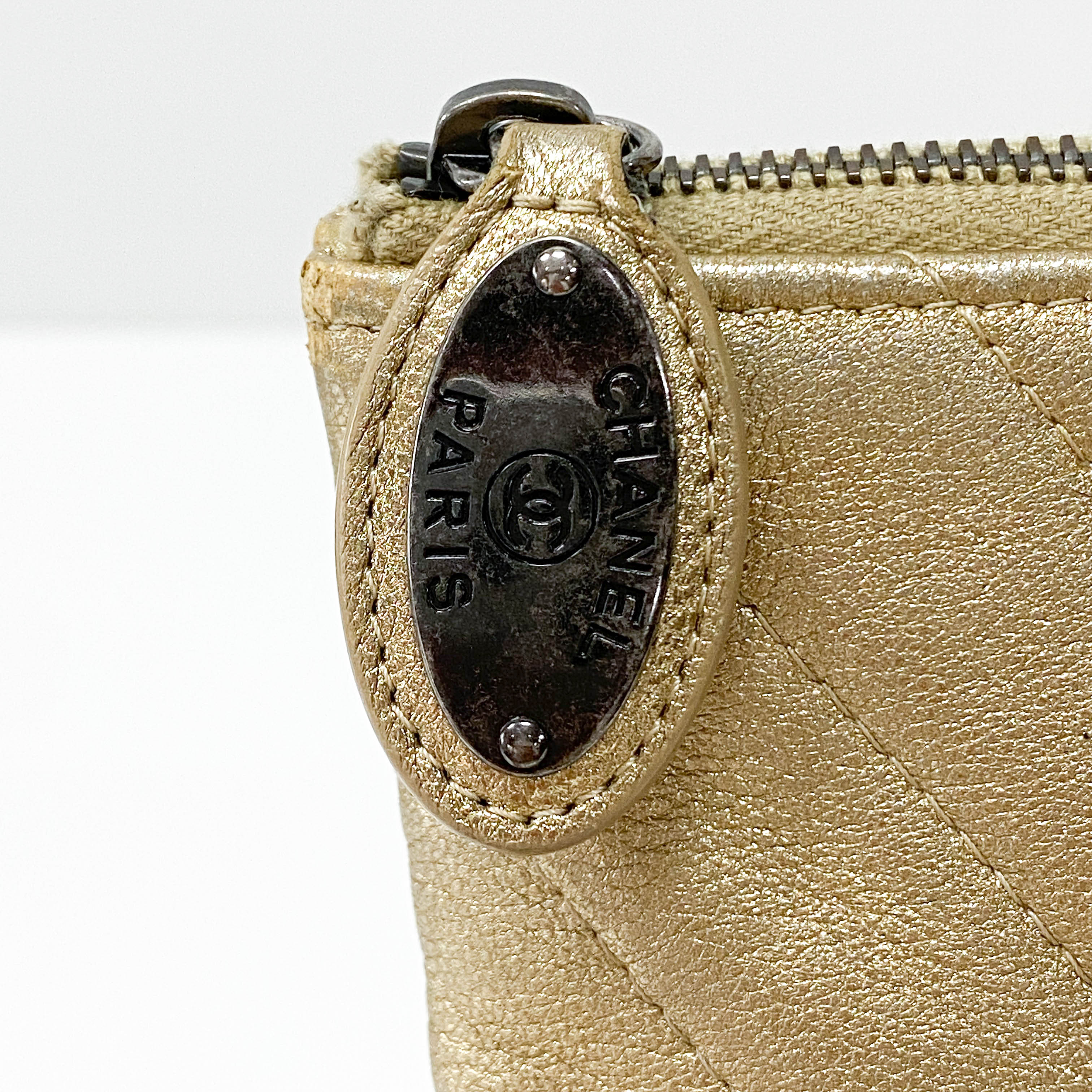 Gold Chevron V Stitch Leather Clutch Bag