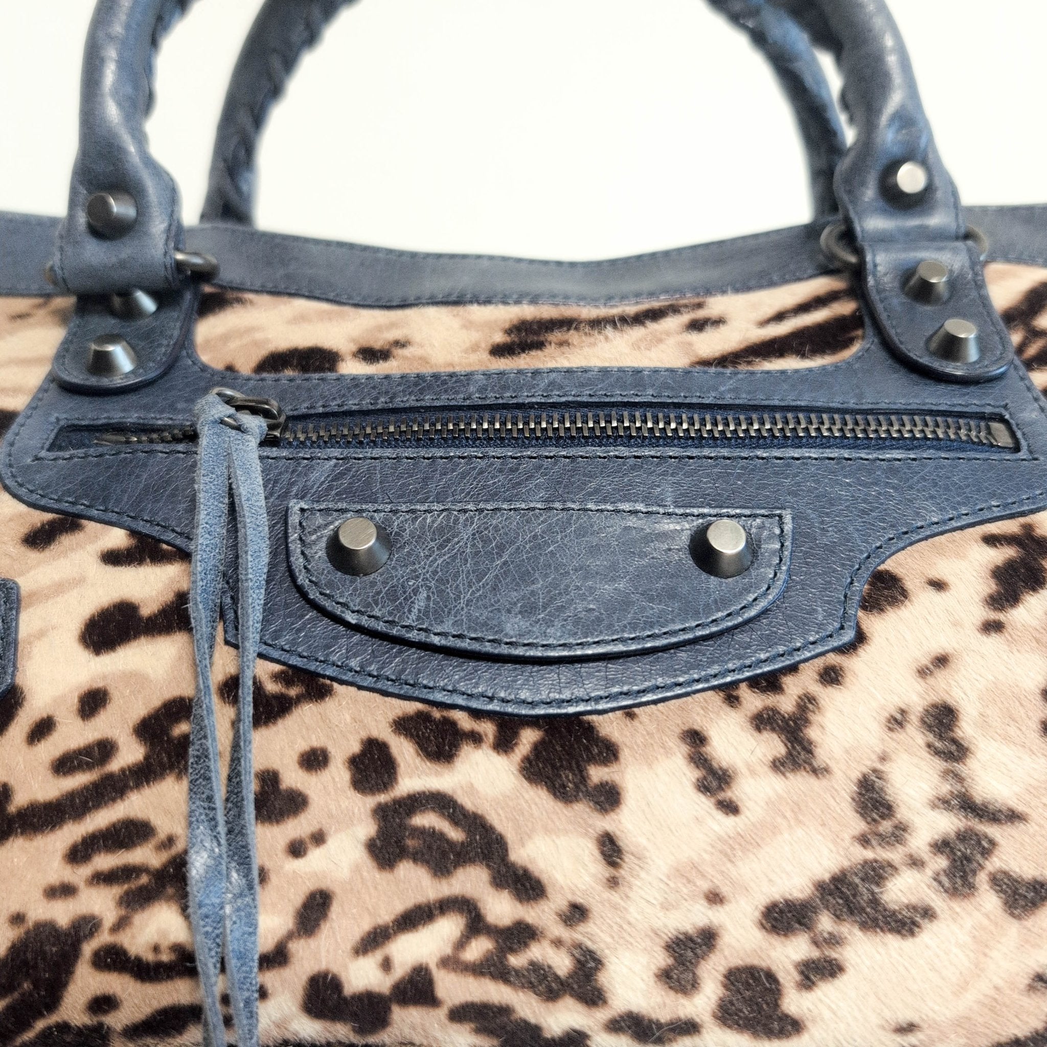 BALENCIAGA City The First Leopard Pony Hair with Navy Leather Handbag, in , Sold by HIVE PRELOVED - Handle Bags, Shoulder Bag