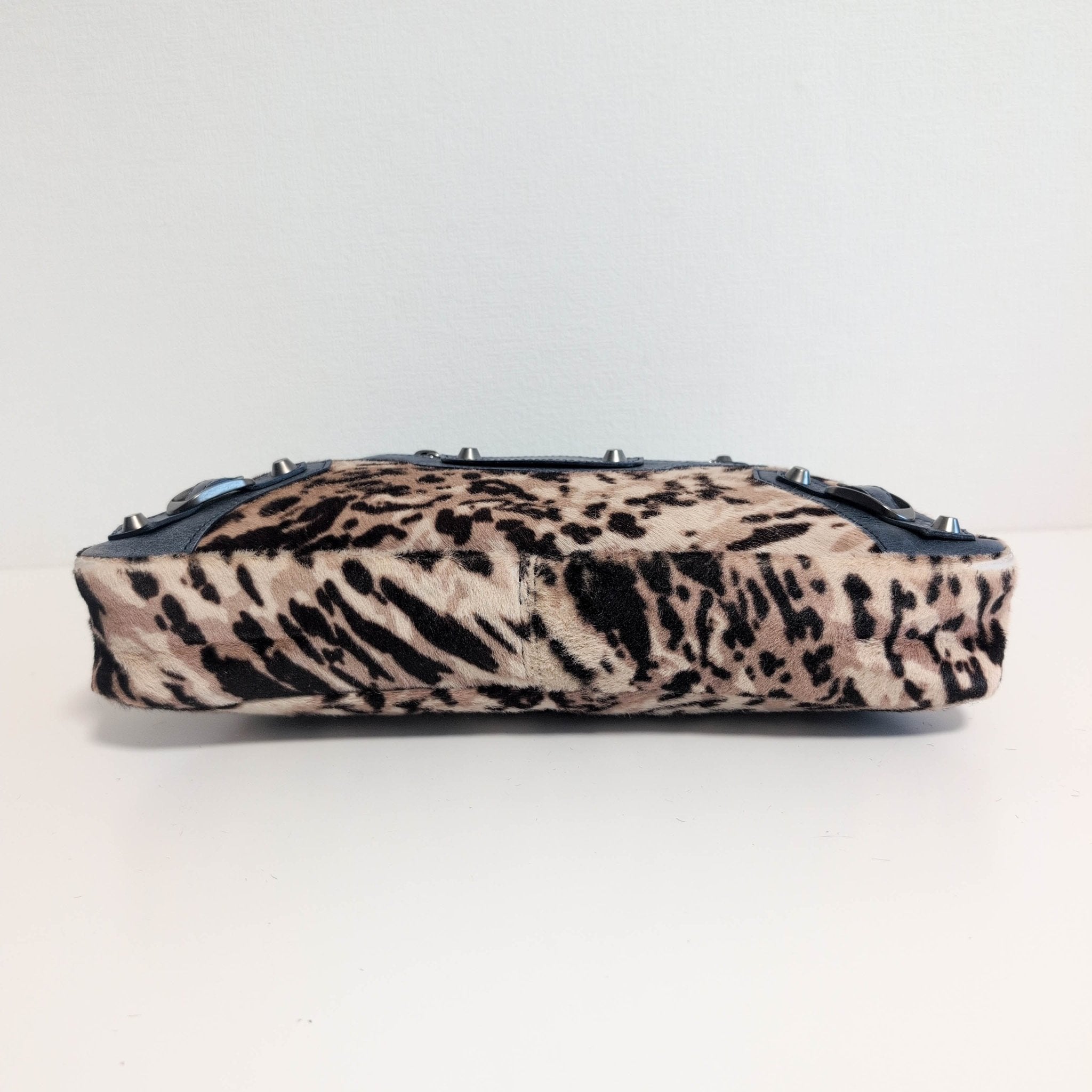 BALENCIAGA City The First Leopard Pony Hair with Navy Leather Handbag, in , Sold by HIVE PRELOVED - Handle Bags, Shoulder Bag