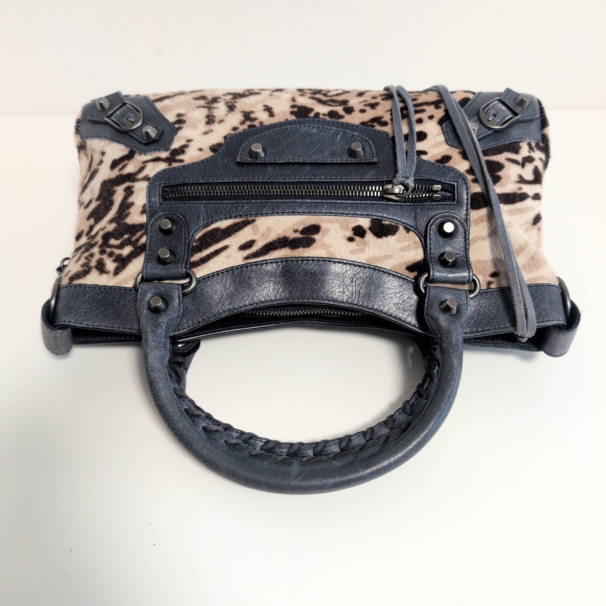 BALENCIAGA City The First Leopard Pony Hair with Navy Leather Handbag, in , Sold by HIVE PRELOVED - Handle Bags, Shoulder Bag