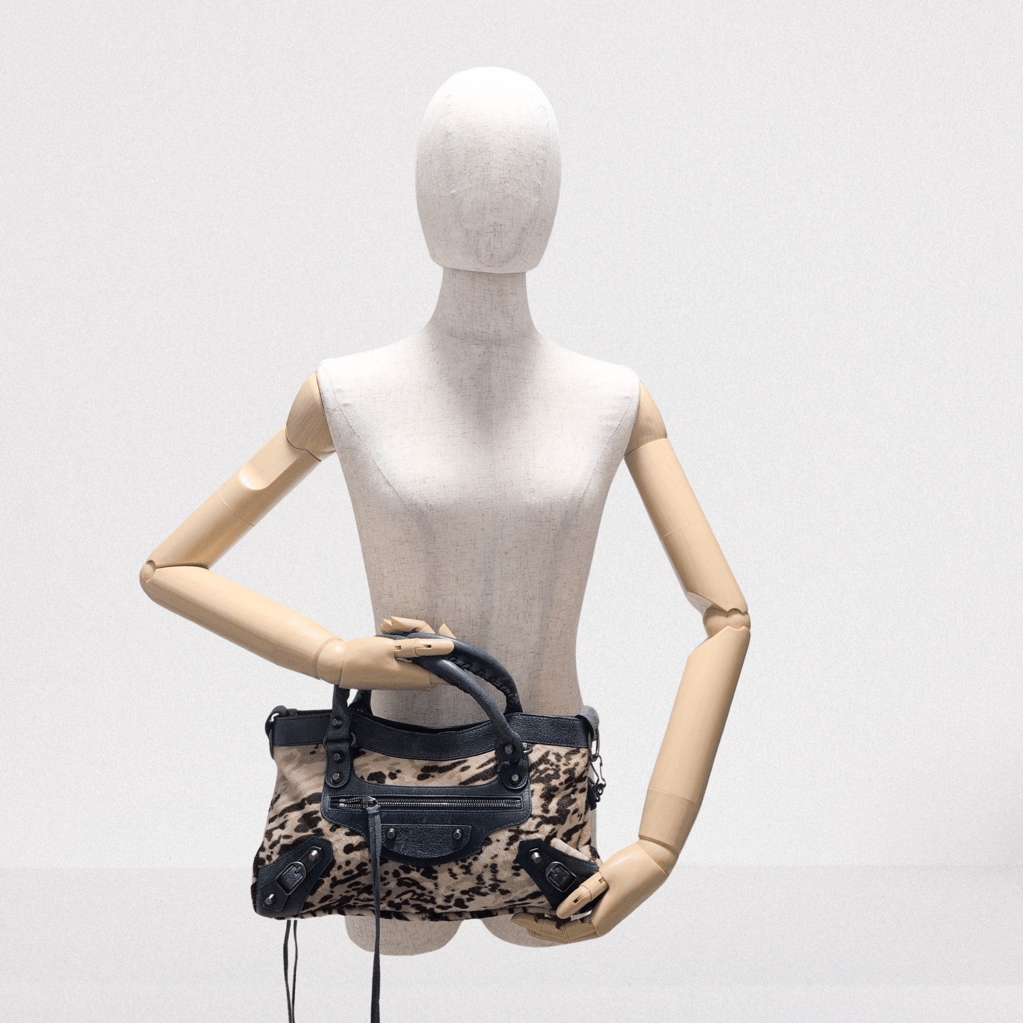 BALENCIAGA City The First Leopard Pony Hair with Navy Leather Handbag, in , Sold by HIVE PRELOVED - Handle Bags, Shoulder Bag