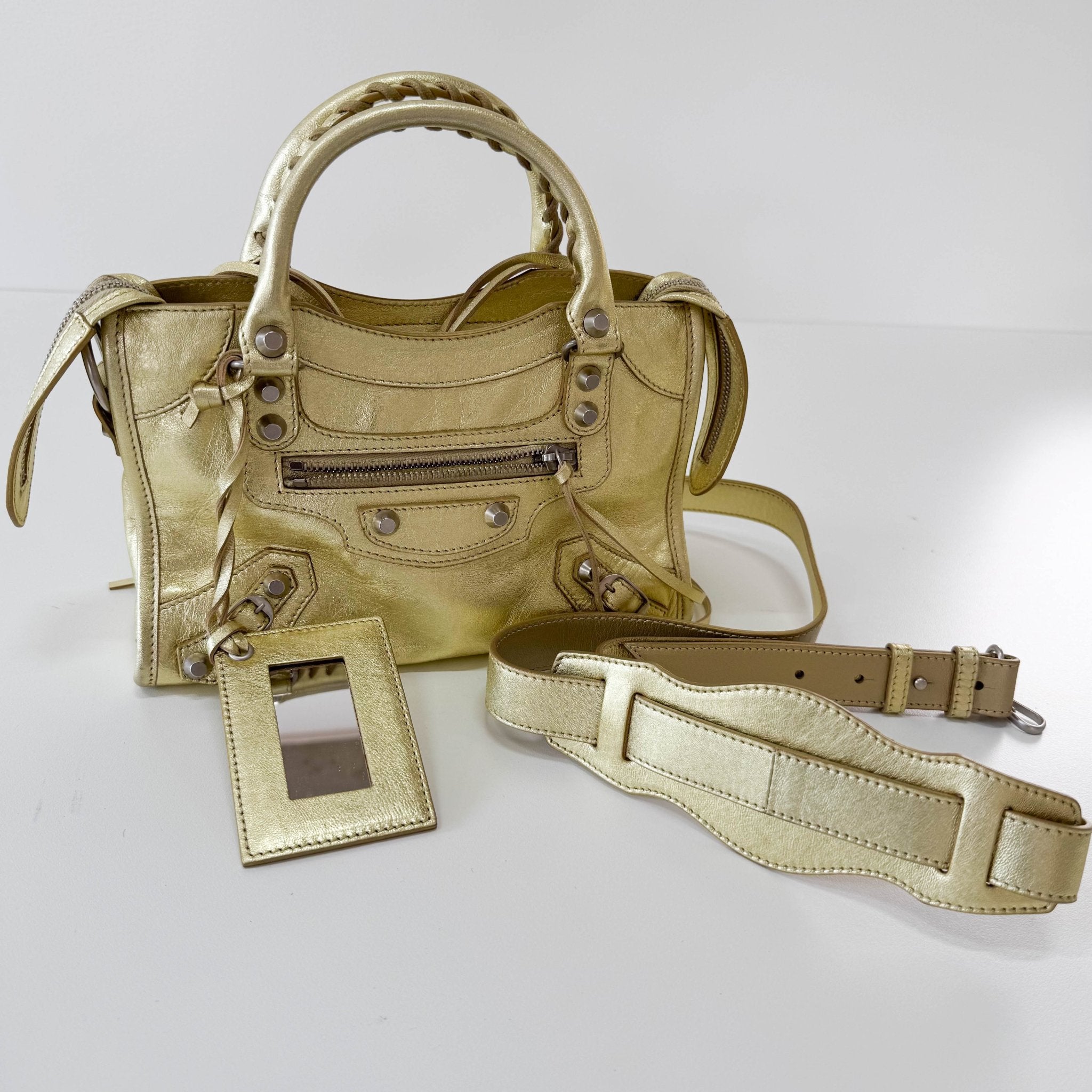 BALENCIAGA The Ciry Metalic Gold Leather Shoulder Bag, in , Sold by HIVE PRELOVED - Handle Bags, Shoulder Bags,