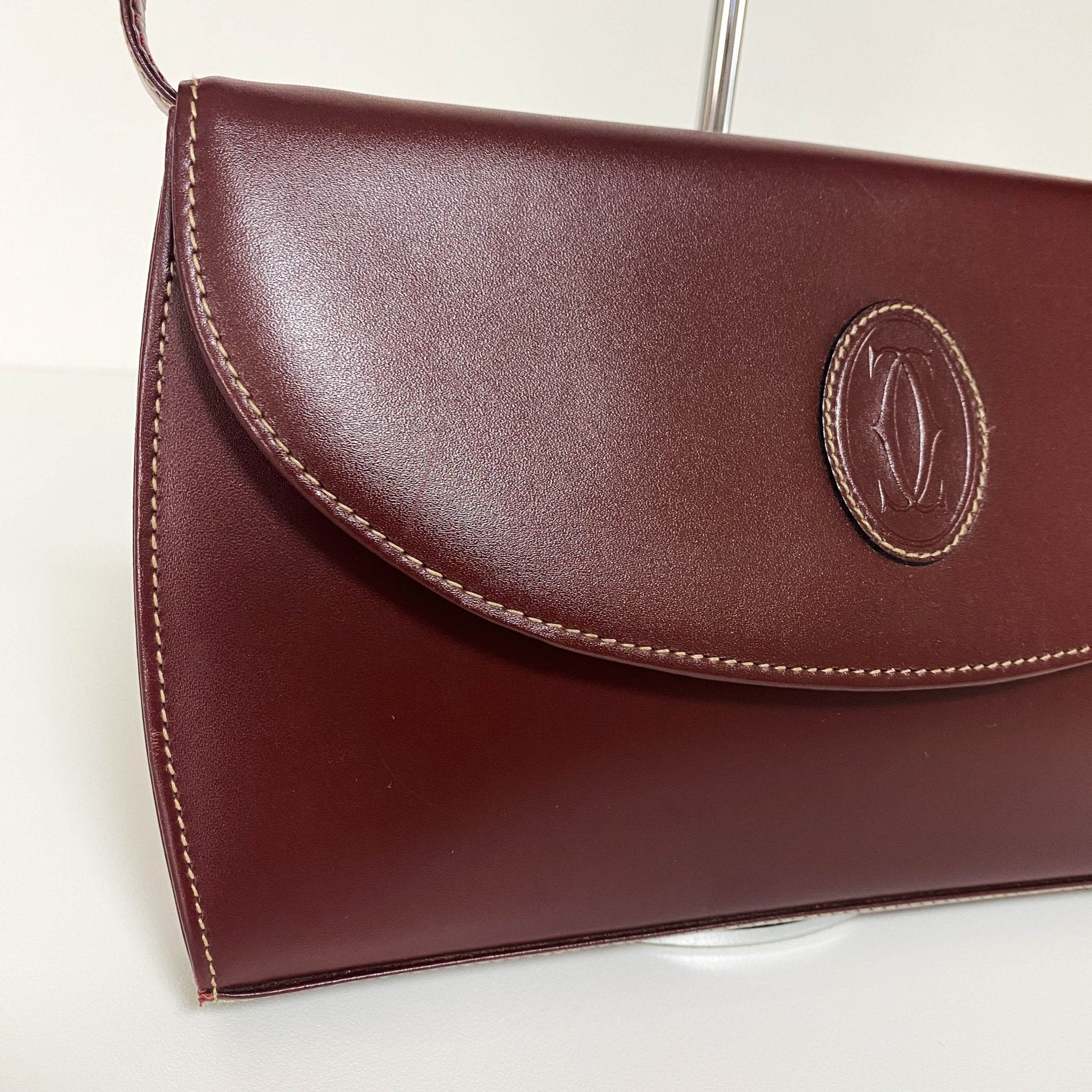 CARTIER Must Line Burgundy Leather Clutch / Shoulder Bag, in , Sold by HIVE PRELOVED - Clutch bags, Shoulder Bags,