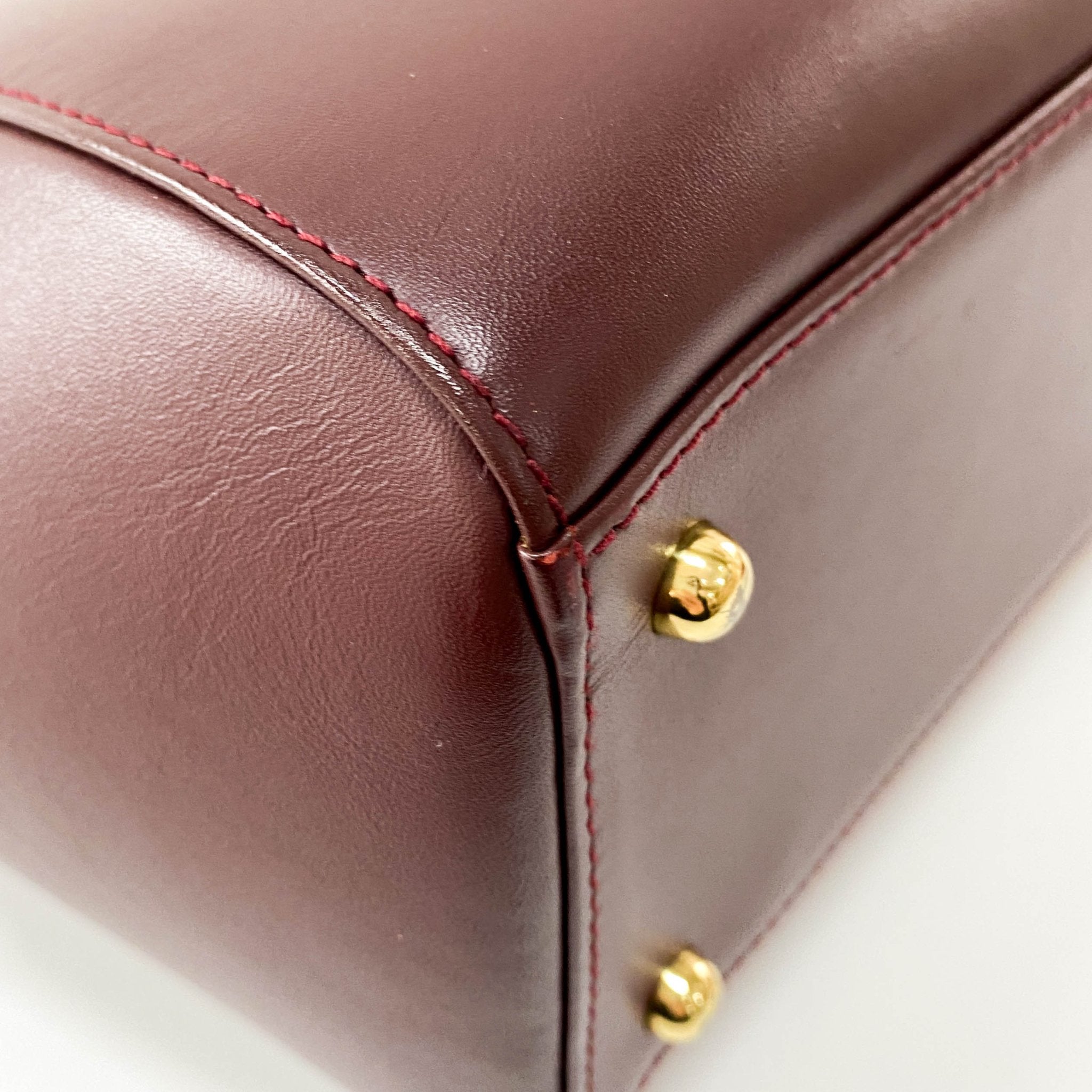 CARTIER Must Line Burgundy Leather Top Handle Bag, in , Sold by HIVE PRELOVED - Handle Bags, Shoulder Bags,