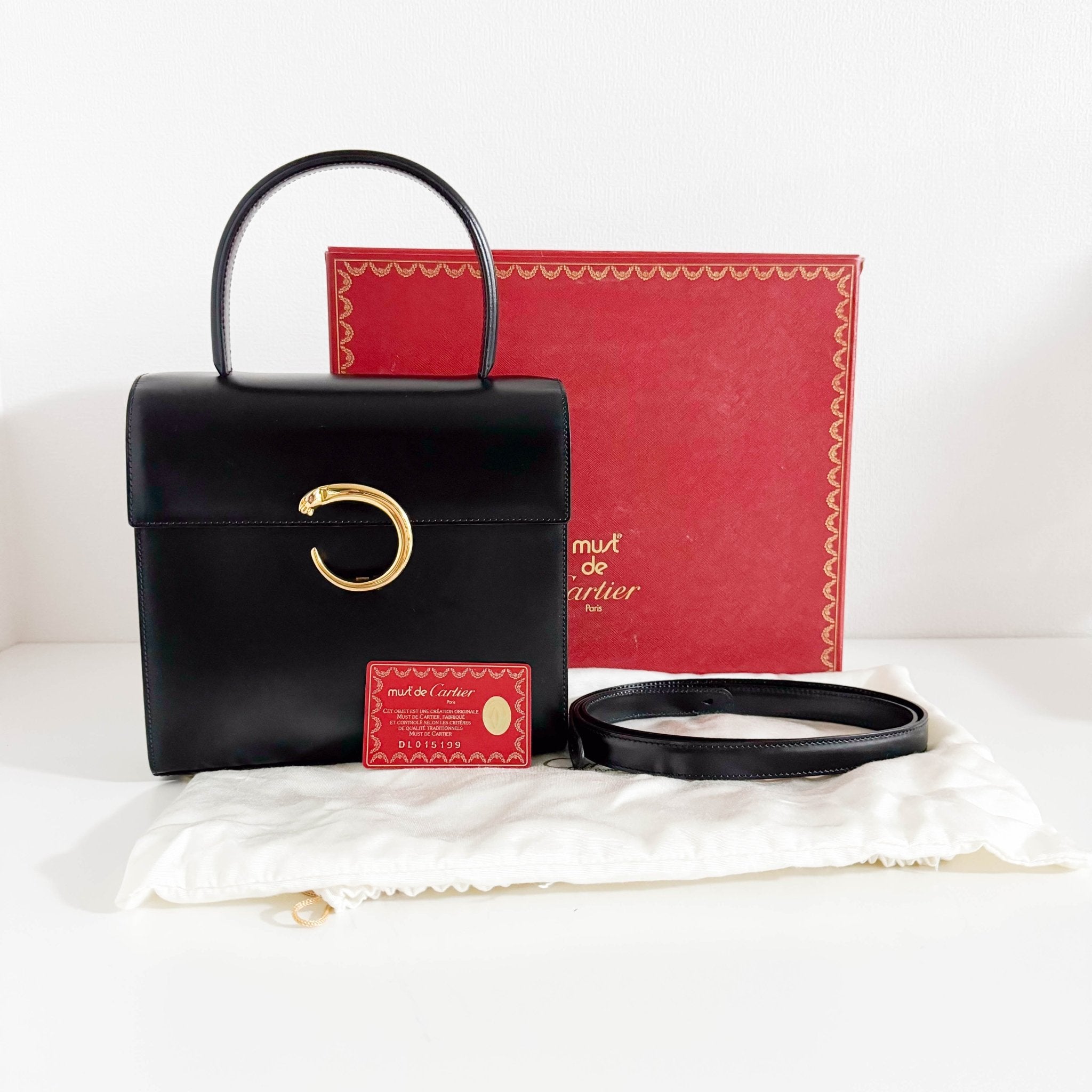 CARTIER Panthère de Cartie Black Calf Leather Top Handle / Crossbody Bag Gold Hardware, in , Sold by HIVE PRELOVED - Crossbody bags, Handle Bags,