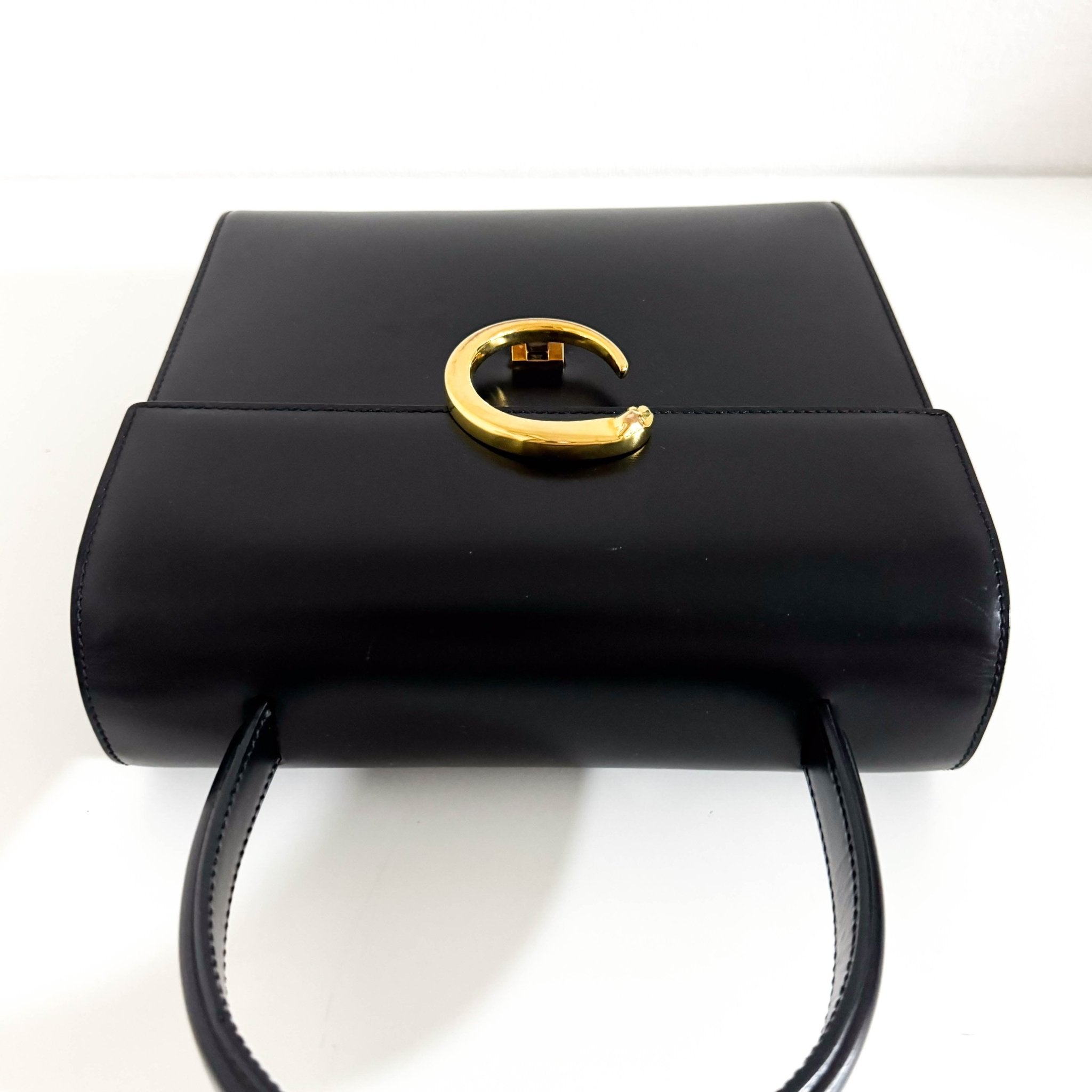 CARTIER Panthère de Cartie Black Calf Leather Top Handle / Crossbody Bag Gold Hardware, in , Sold by HIVE PRELOVED - Crossbody bags, Handle Bags,