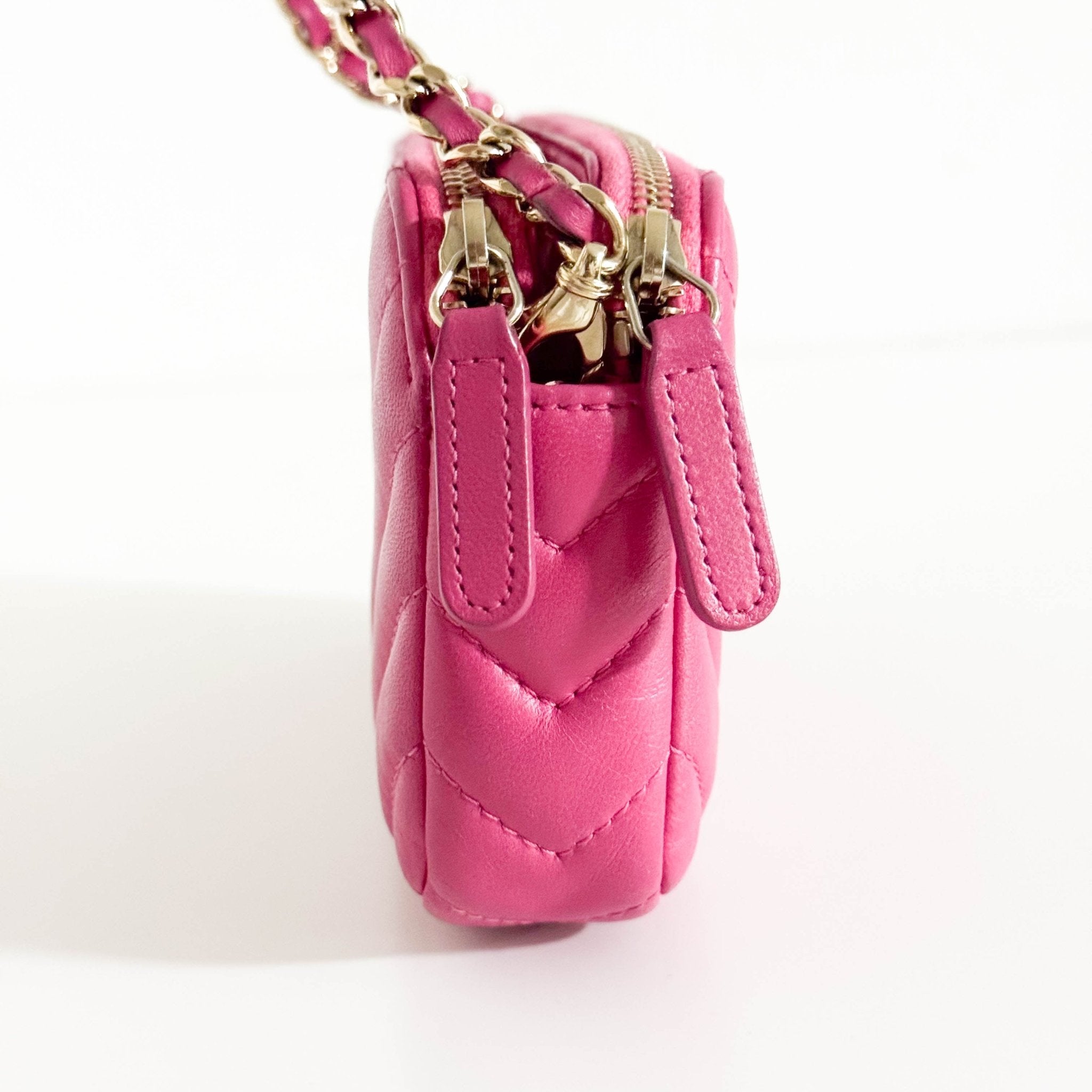 CHANEL Chevron CC V - Stitched Lambskin Mini Chain Crossbody Bag Pink / Gold Hardware, in Sold by HIVE PRELOVED Crossbody bag