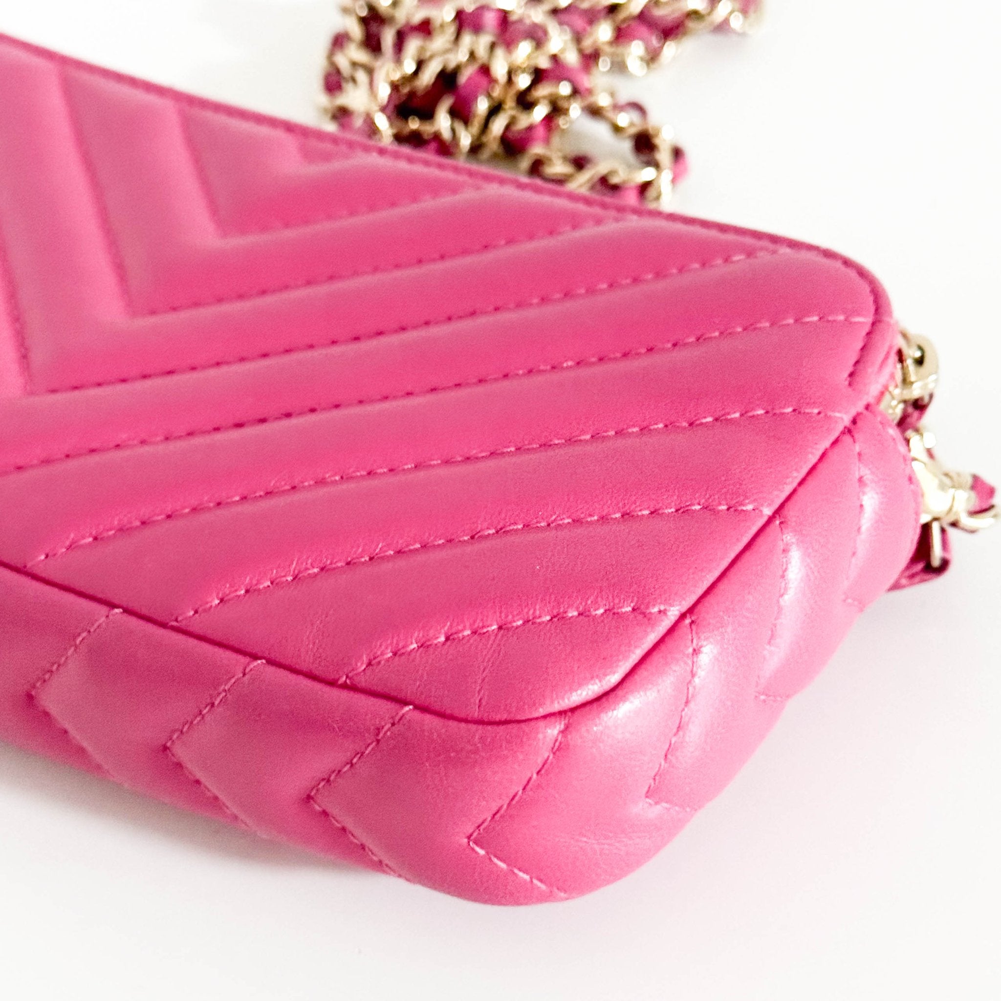 CHANEL Chevron CC V - Stitched Lambskin Mini Chain Crossbody Bag Pink / Gold Hardware, in Sold by HIVE PRELOVED Crossbody bag