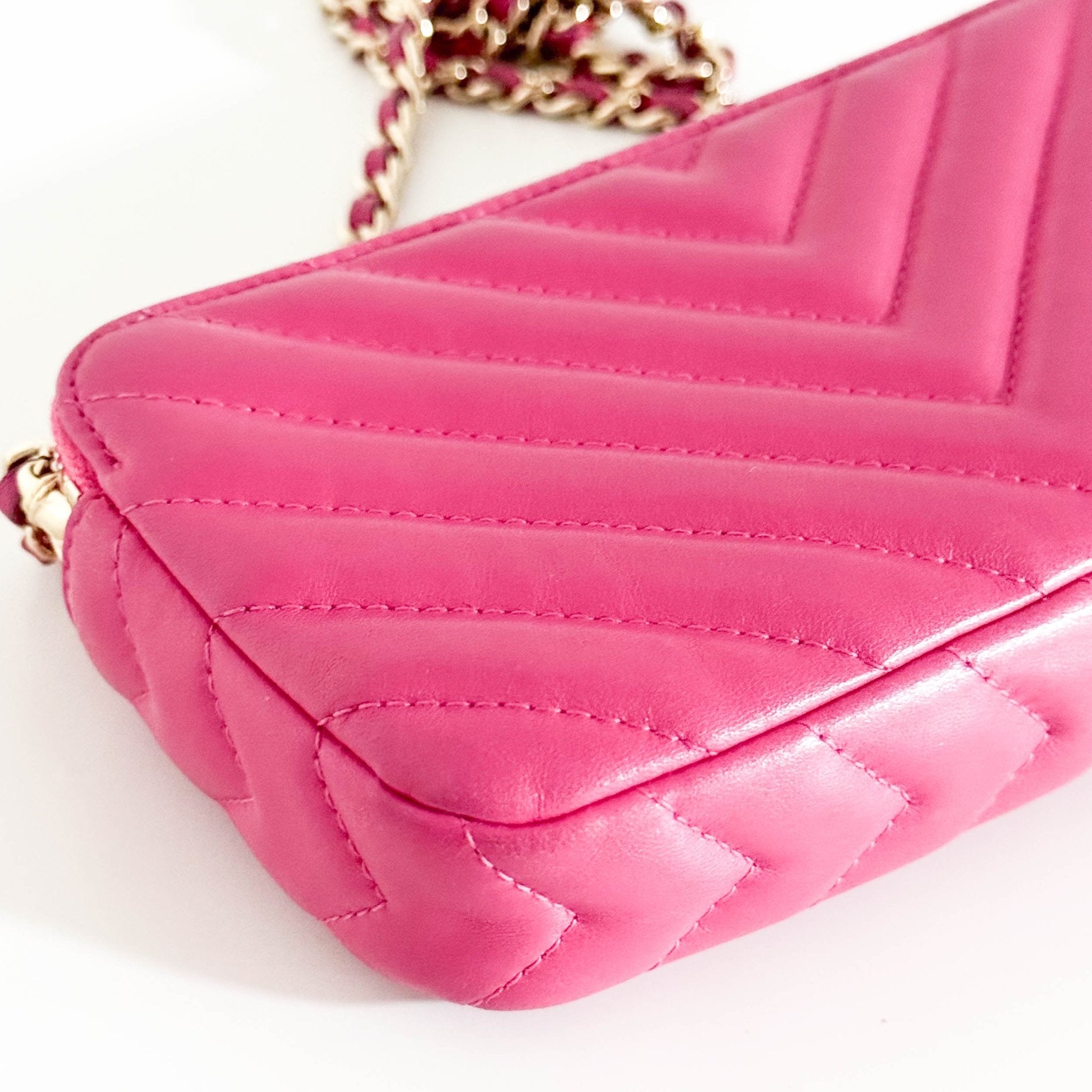 CHANEL Chevron CC V - Stitched Lambskin Mini Chain Crossbody Bag Pink / Gold Hardware, in Sold by HIVE PRELOVED Crossbody bag