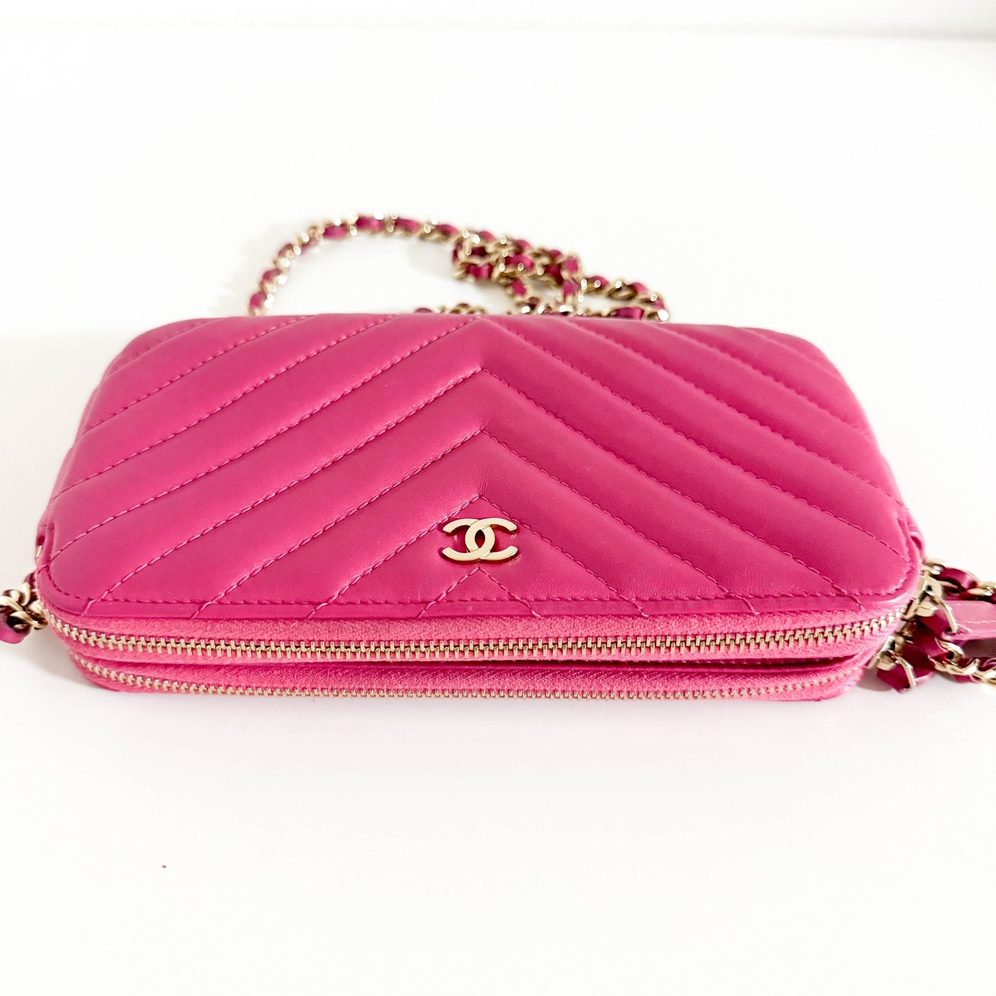 CHANEL Chevron CC V - Stitched Lambskin Mini Chain Crossbody Bag Pink / Gold Hardware, in Sold by HIVE PRELOVED Crossbody bag
