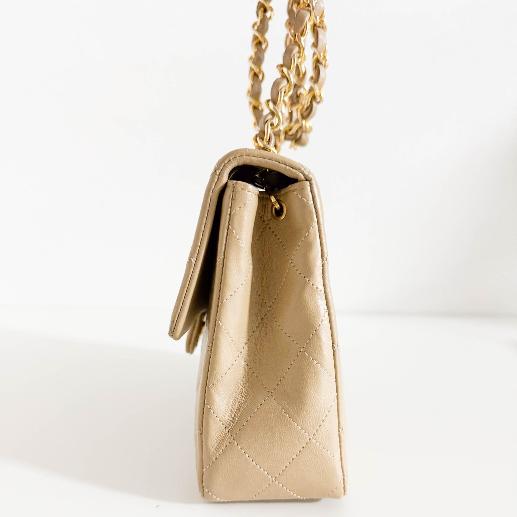 CHANEL Classic Flap Beige Lambskin Medium Gold Chain Shoulder Bag, in , Sold by HIVE PRELOVED - Crossbody bags, ,