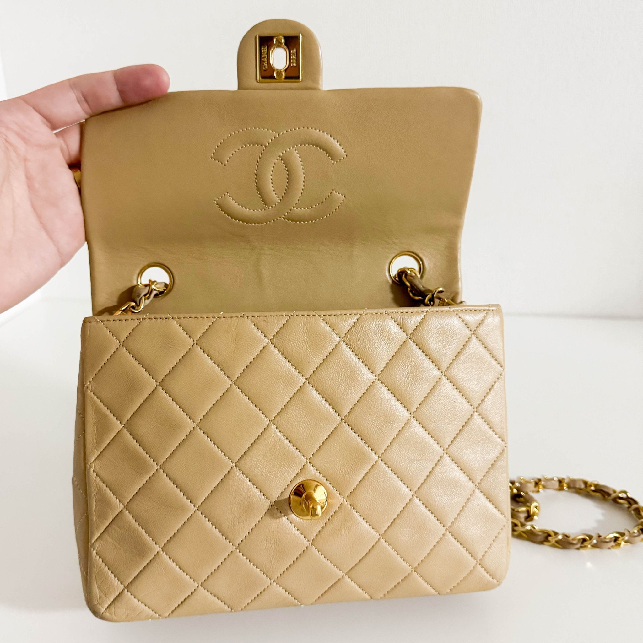 CHANEL Classic Flap Beige Lambskin Medium Gold Chain Shoulder Bag, in , Sold by HIVE PRELOVED - Crossbody bags, ,