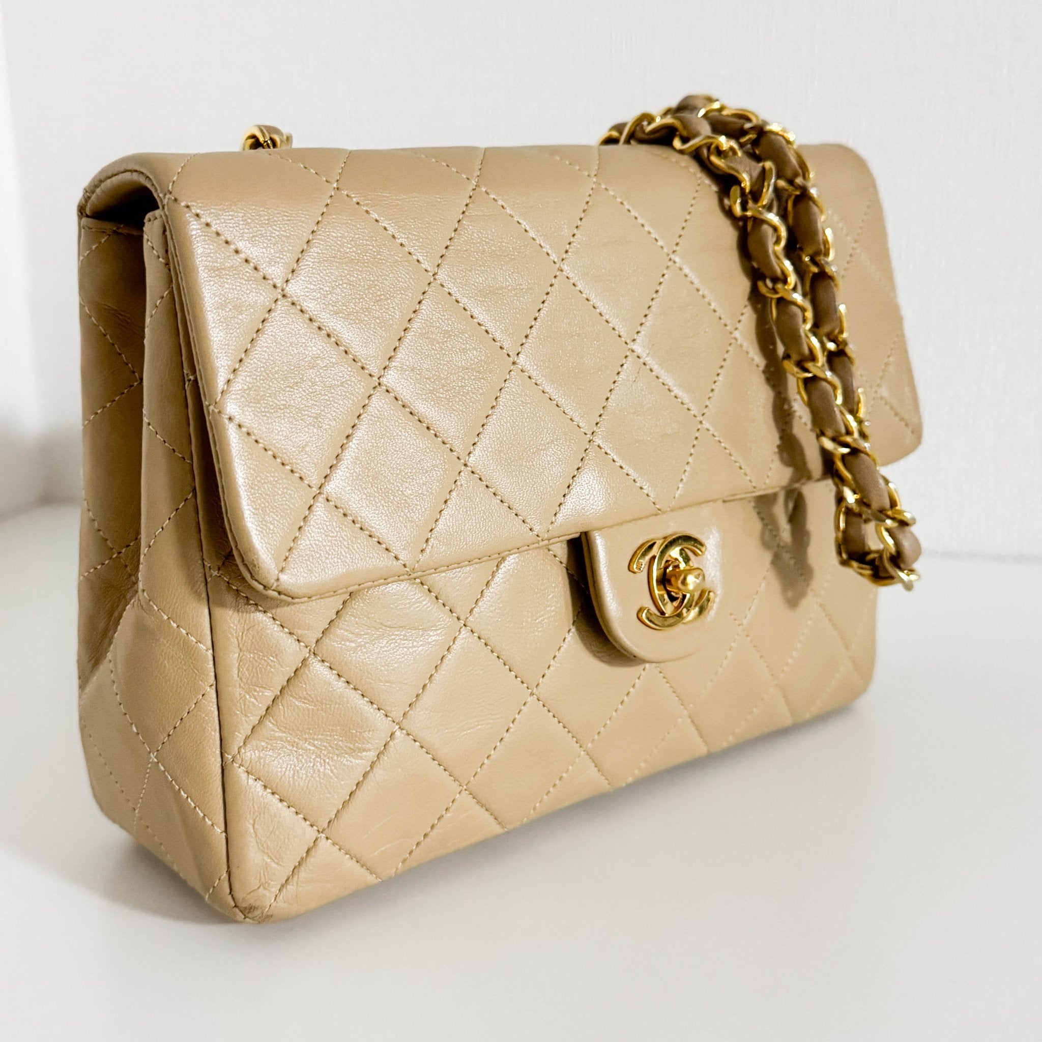 CHANEL Classic Flap Beige Lambskin Medium Gold Chain Shoulder Bag, in , Sold by HIVE PRELOVED - Crossbody bags, ,