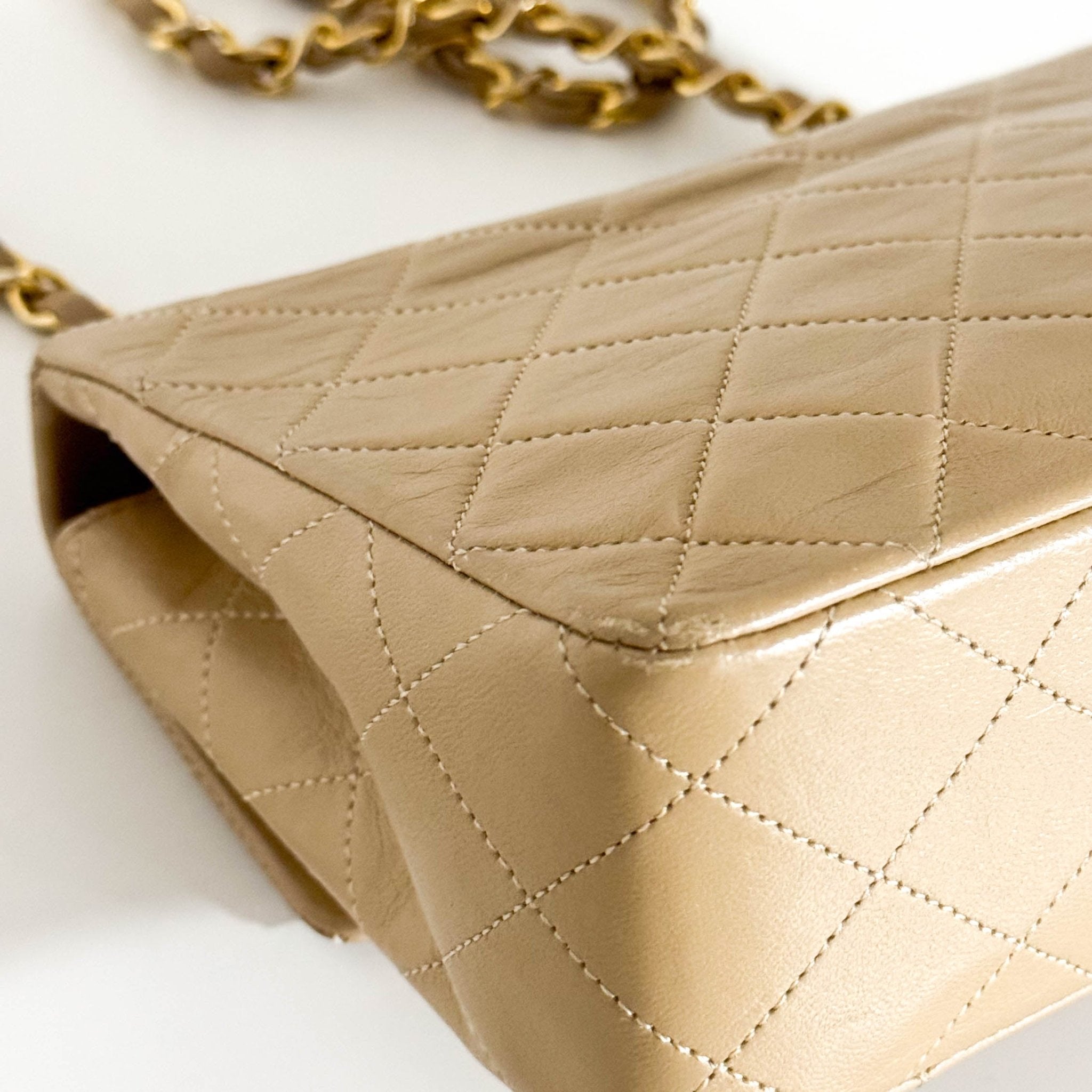 CHANEL Classic Flap Beige Lambskin Medium Gold Chain Shoulder Bag, in , Sold by HIVE PRELOVED - Crossbody bags, ,