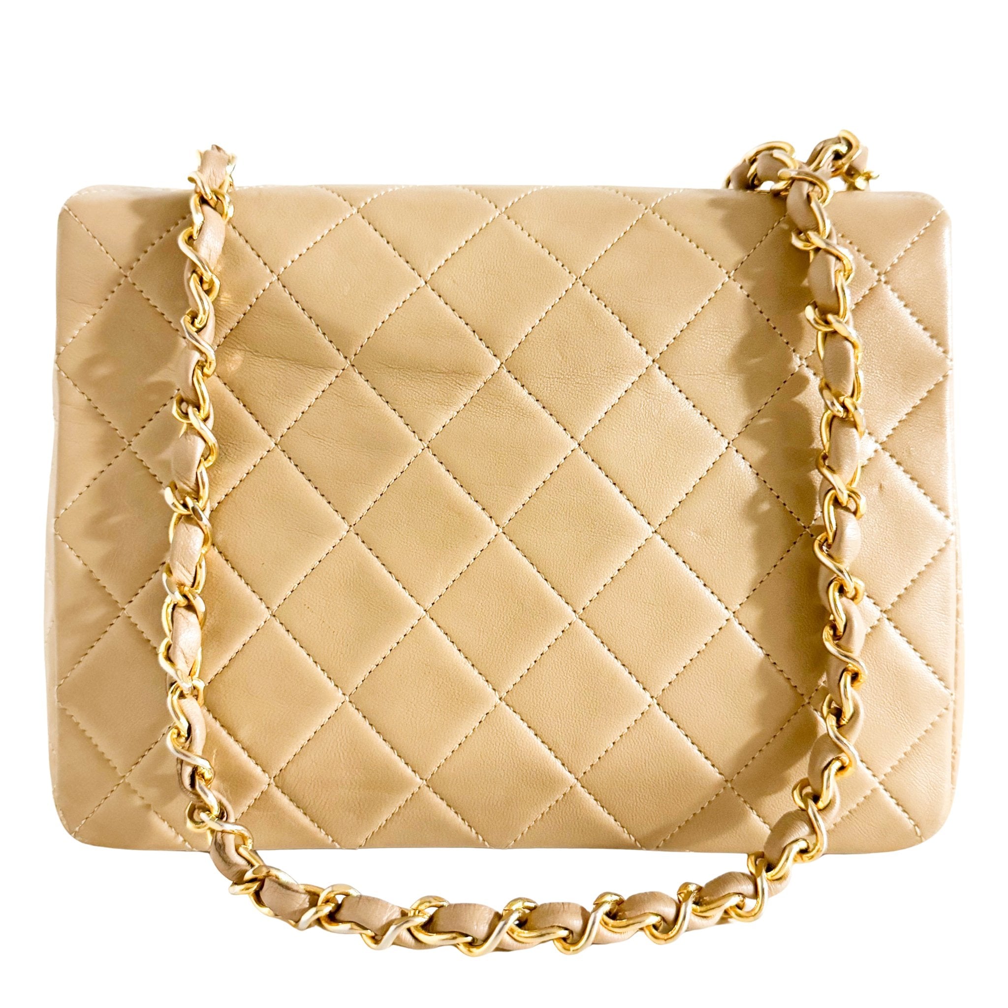 CHANEL Classic Flap Beige Lambskin Medium Gold Chain Shoulder Bag, in , Sold by HIVE PRELOVED - Crossbody bags, ,