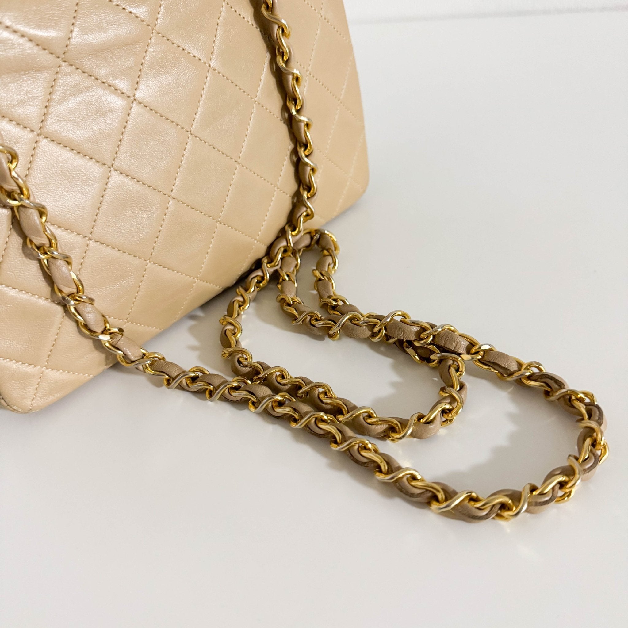 CHANEL Classic Flap Beige Lambskin Medium Gold Chain Shoulder Bag, in , Sold by HIVE PRELOVED - Crossbody bags, ,