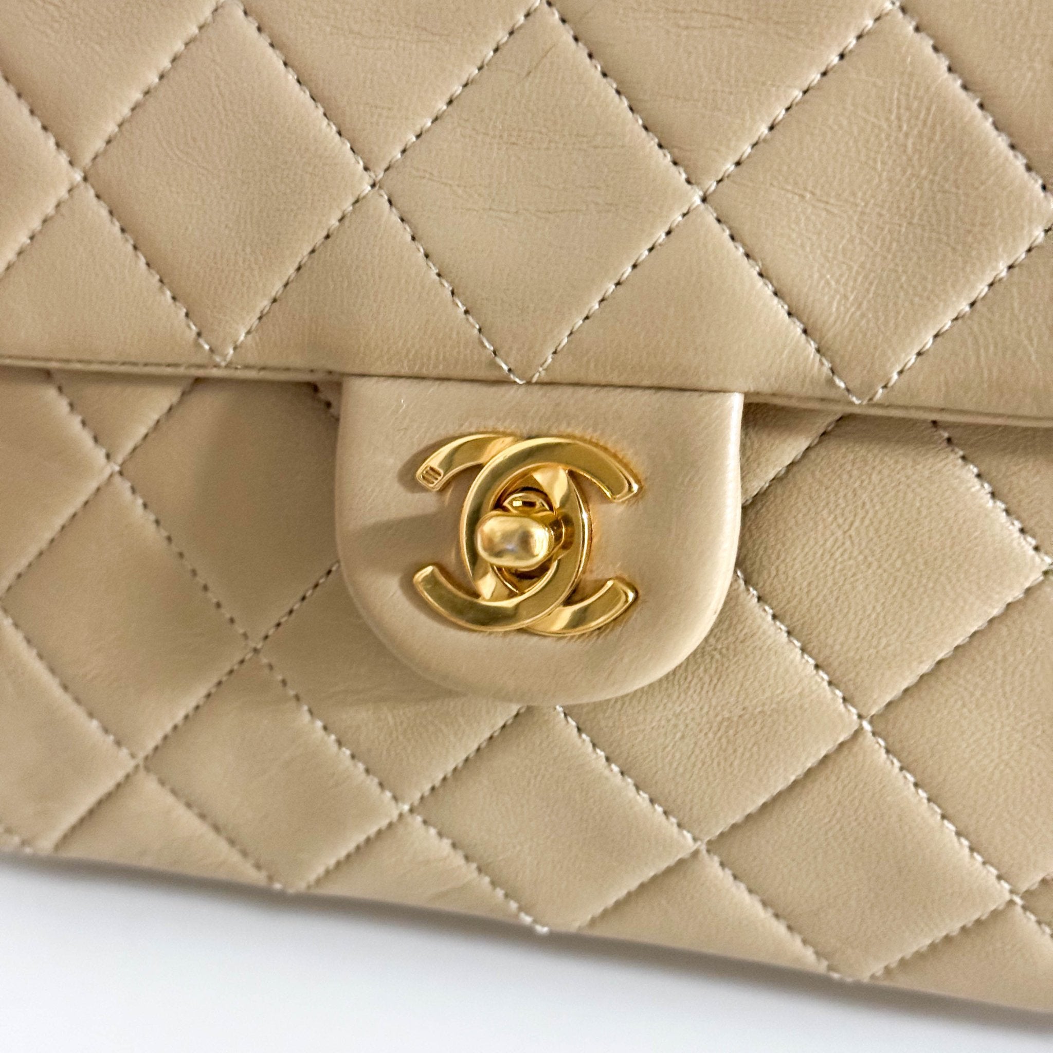 CHANEL Classic Flap Beige Lambskin Medium Gold Chain Shoulder Bag, in , Sold by HIVE PRELOVED - Crossbody bags, ,
