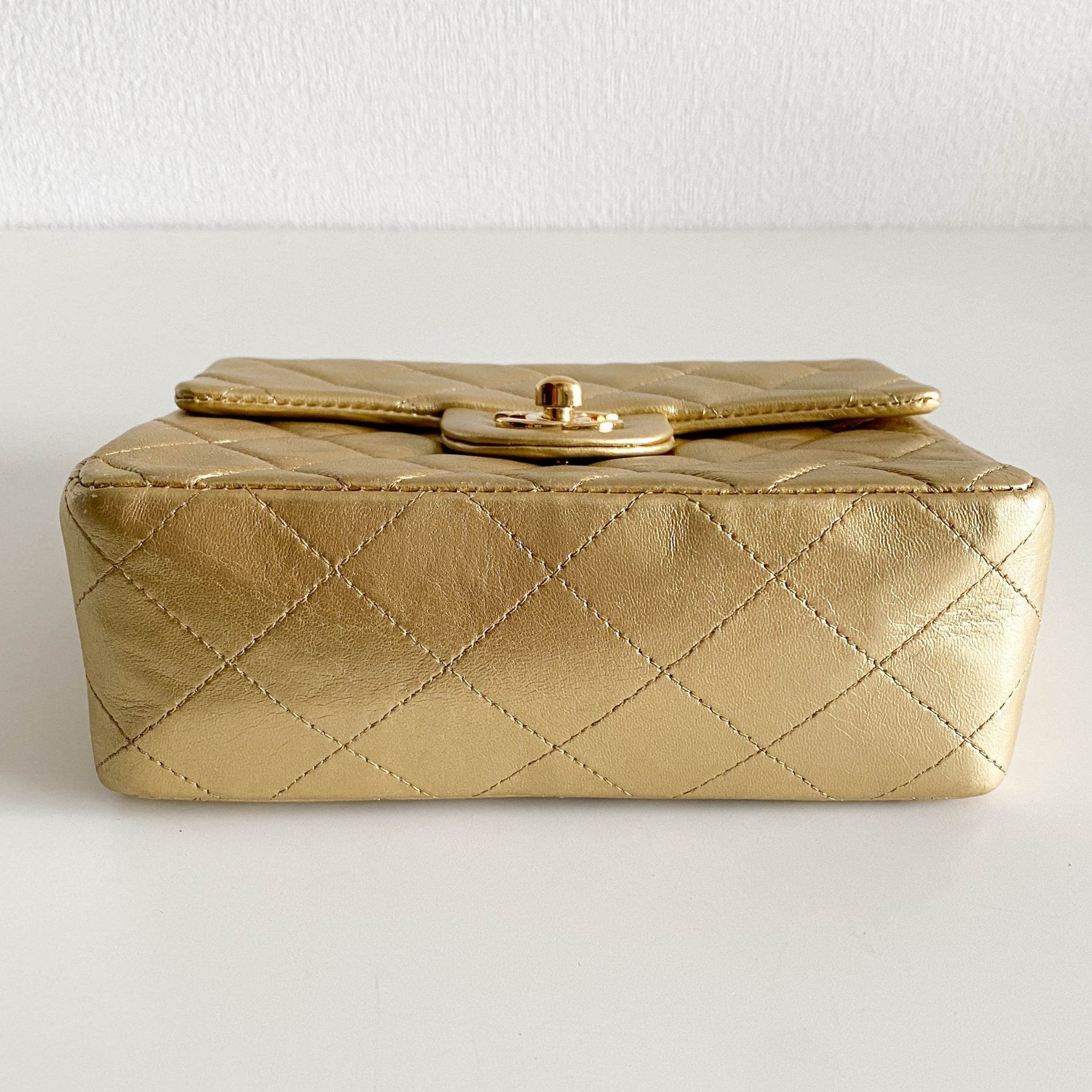 CHANEL Classic Flap Gold Lambskin Mini Gold Chain Shoulder Bag, in , Sold by HIVE PRELOVED - Crossbody bags, ,