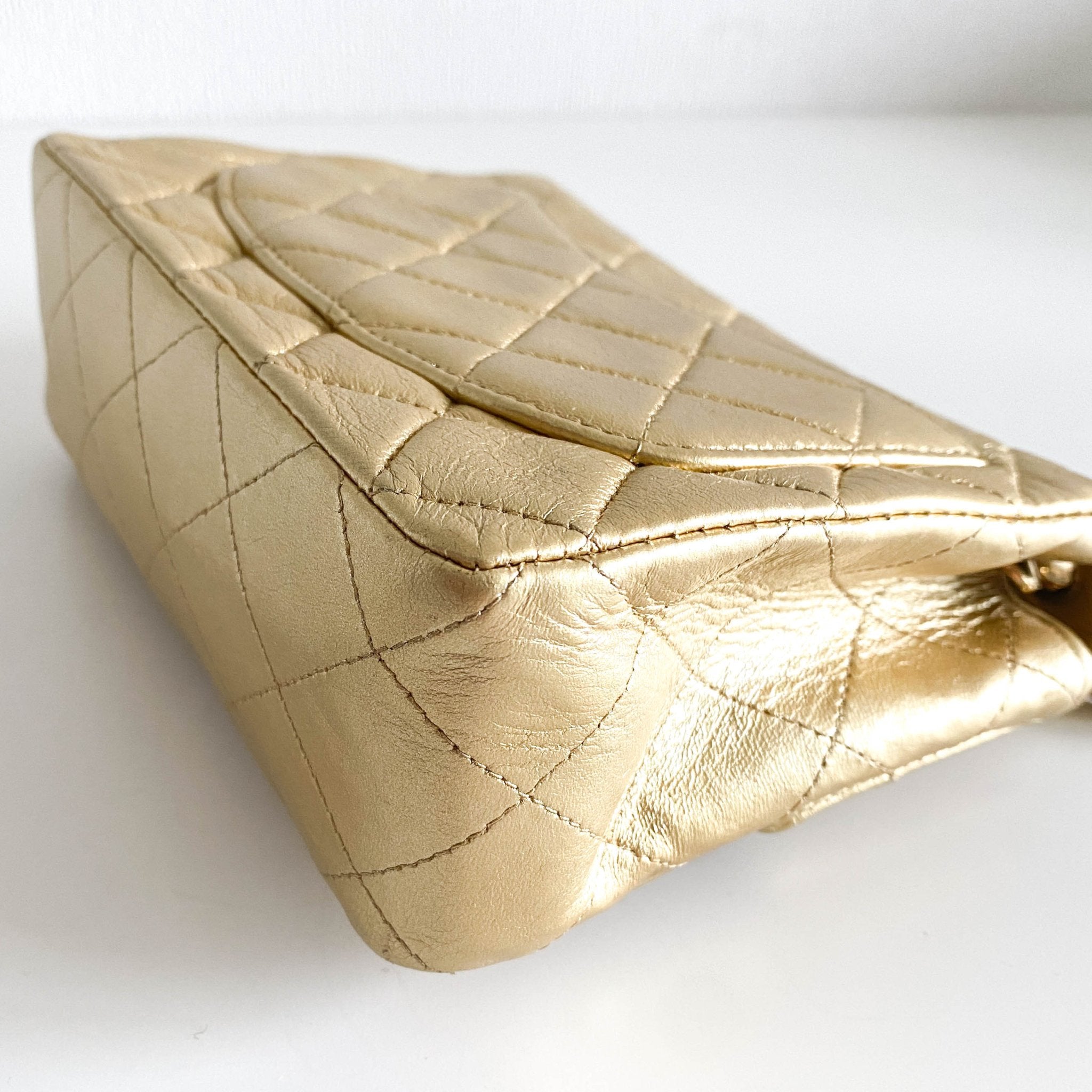 CHANEL Classic Flap Gold Lambskin Mini Gold Chain Shoulder Bag, in , Sold by HIVE PRELOVED - Crossbody bags, ,