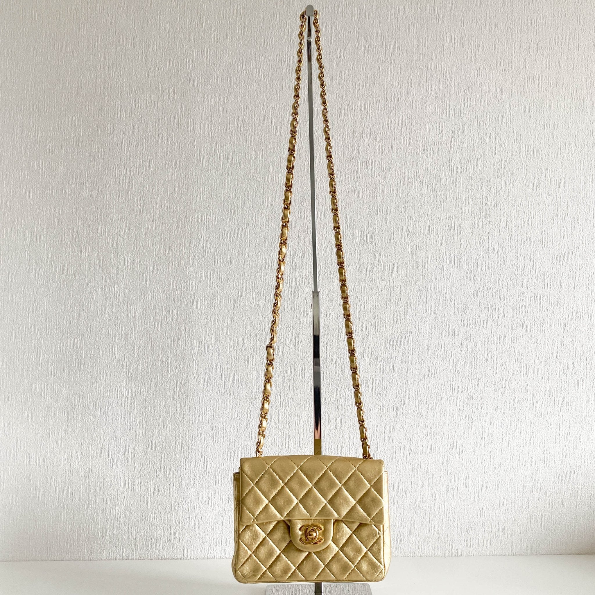 CHANEL Classic Flap Gold Lambskin Mini Gold Chain Shoulder Bag, in , Sold by HIVE PRELOVED - Crossbody bags, ,