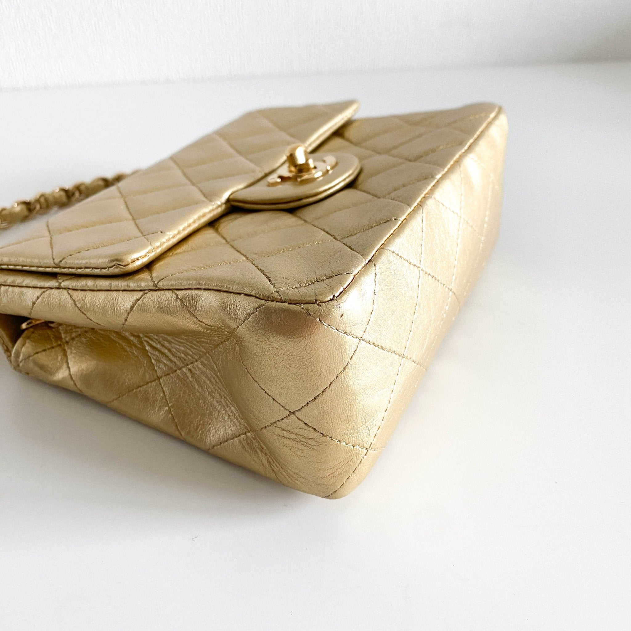 CHANEL Classic Flap Gold Lambskin Mini Gold Chain Shoulder Bag, in , Sold by HIVE PRELOVED - Crossbody bags, ,