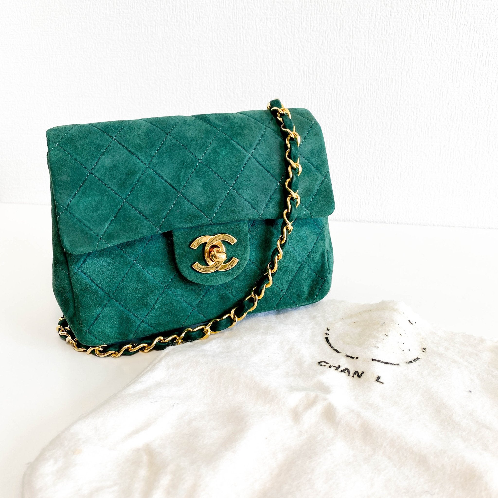 CHANEL Green Quilted Suede Mini Square Classic Single Flap Gold Hardware, 1989 - 1991, in , Sold by HIVE PRELOVED - Crossbody bags, Mini bags,