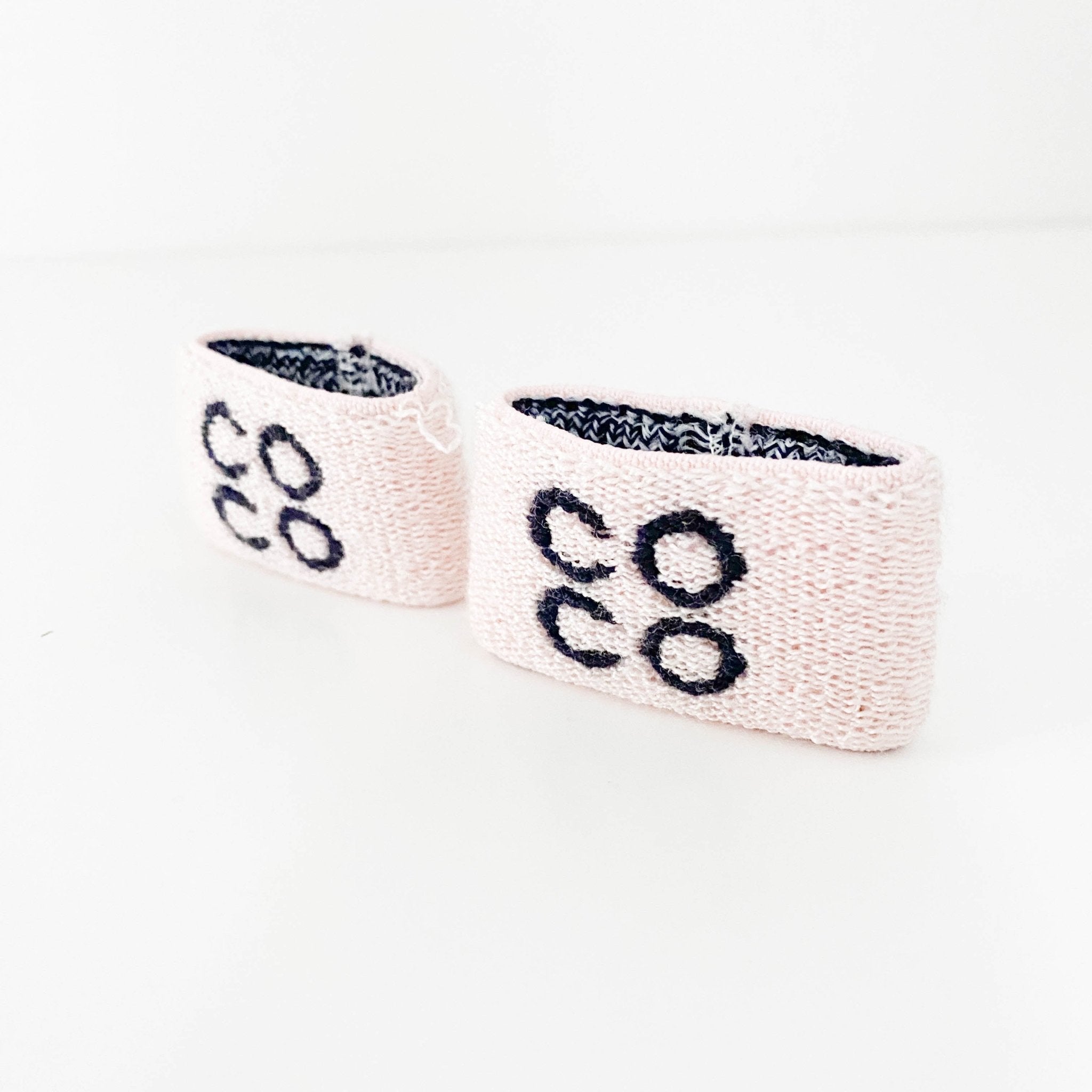 CHANEL Pink/Black CC Logo Pile Wristband Band Gym Bracelet, in , Sold by HIVE PRELOVED - Bracelets / Bangles, ,