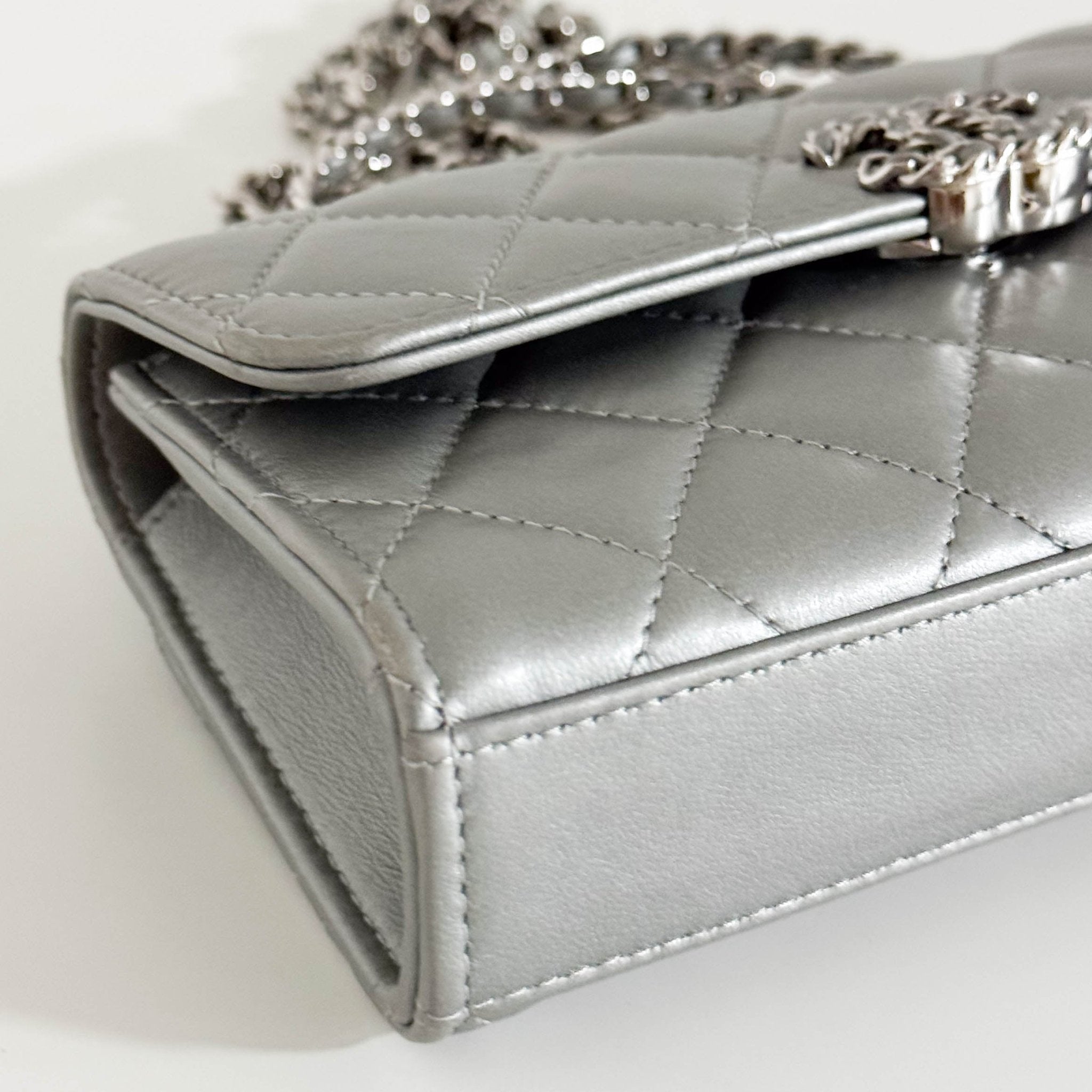 CHANEL Timeless Classic Top Handle Flap Silver Lambskin Mini Chain Wallet Shoulder Bag in  Sold by HIVE PRELOVED