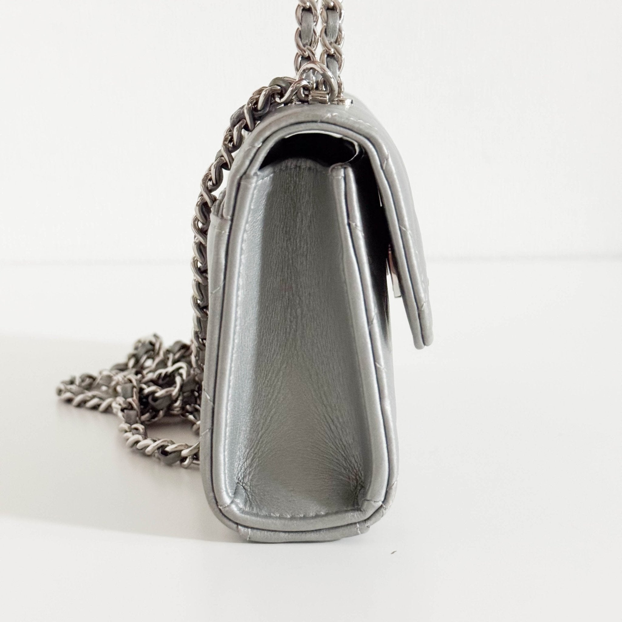 CHANEL Timeless Classic Top Handle Flap Silver Lambskin Mini Chain Wallet Shoulder Bag in  Sold by HIVE PRELOVED