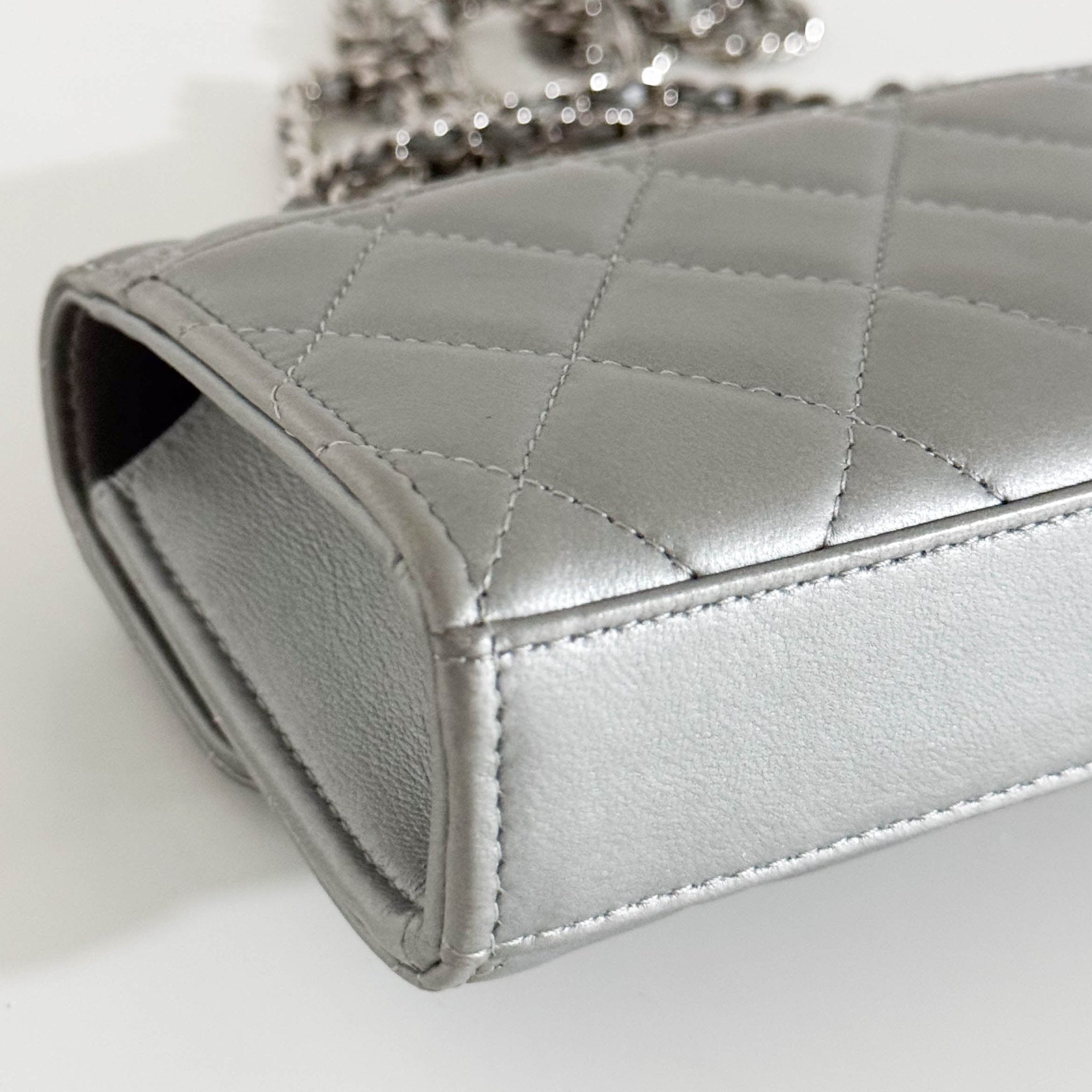 CHANEL Timeless Classic Top Handle Flap Silver Lambskin Mini Chain Wallet Shoulder Bag in  Sold by HIVE PRELOVED
