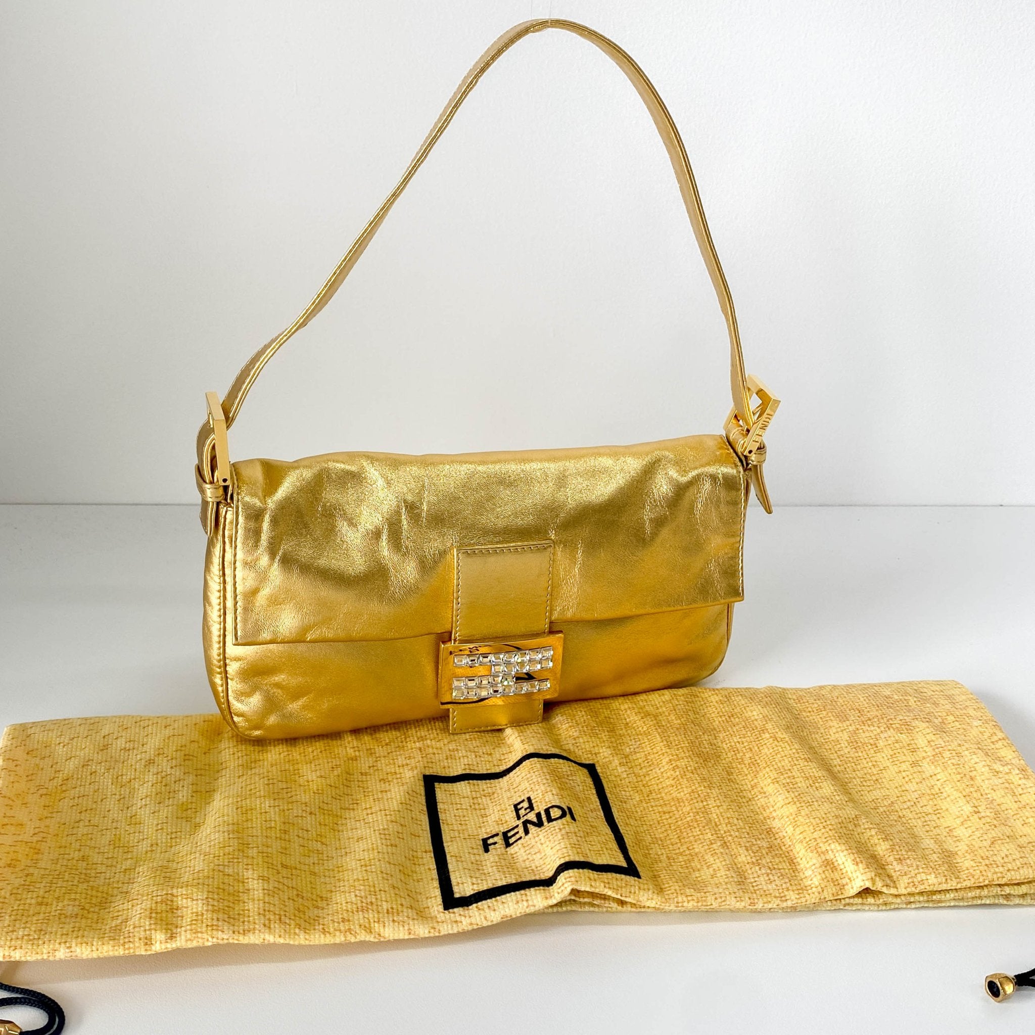 FENDI Baguette Gold Leather & Rhinestone FF Buckle Shoulder Bag, in , Sold by HIVE PRELOVED - Shoulder Bags, ,