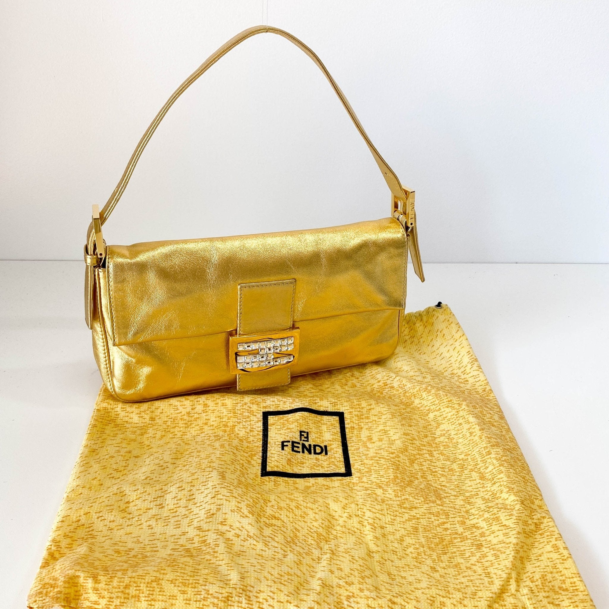 FENDI Baguette Gold Leather with Rhinestone Buckle Shoulder Bag, in , Sold by HIVE PRELOVED - Shoulder Bags, ,