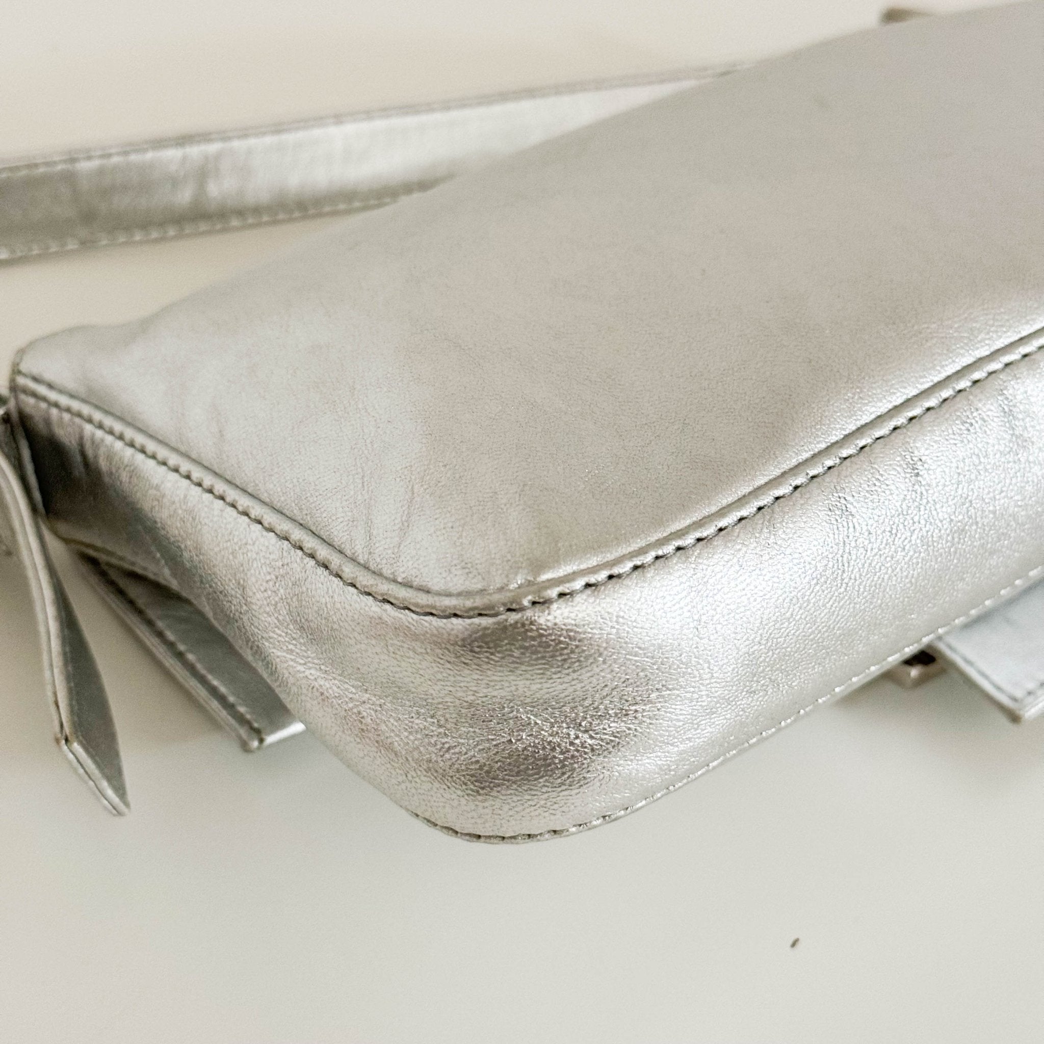 FENDI Baguette Metallic Silver Leather Rhinestone Hardware Shoulder Bag, in , Sold by HIVE PRELOVED - Shoulder Bags, ,