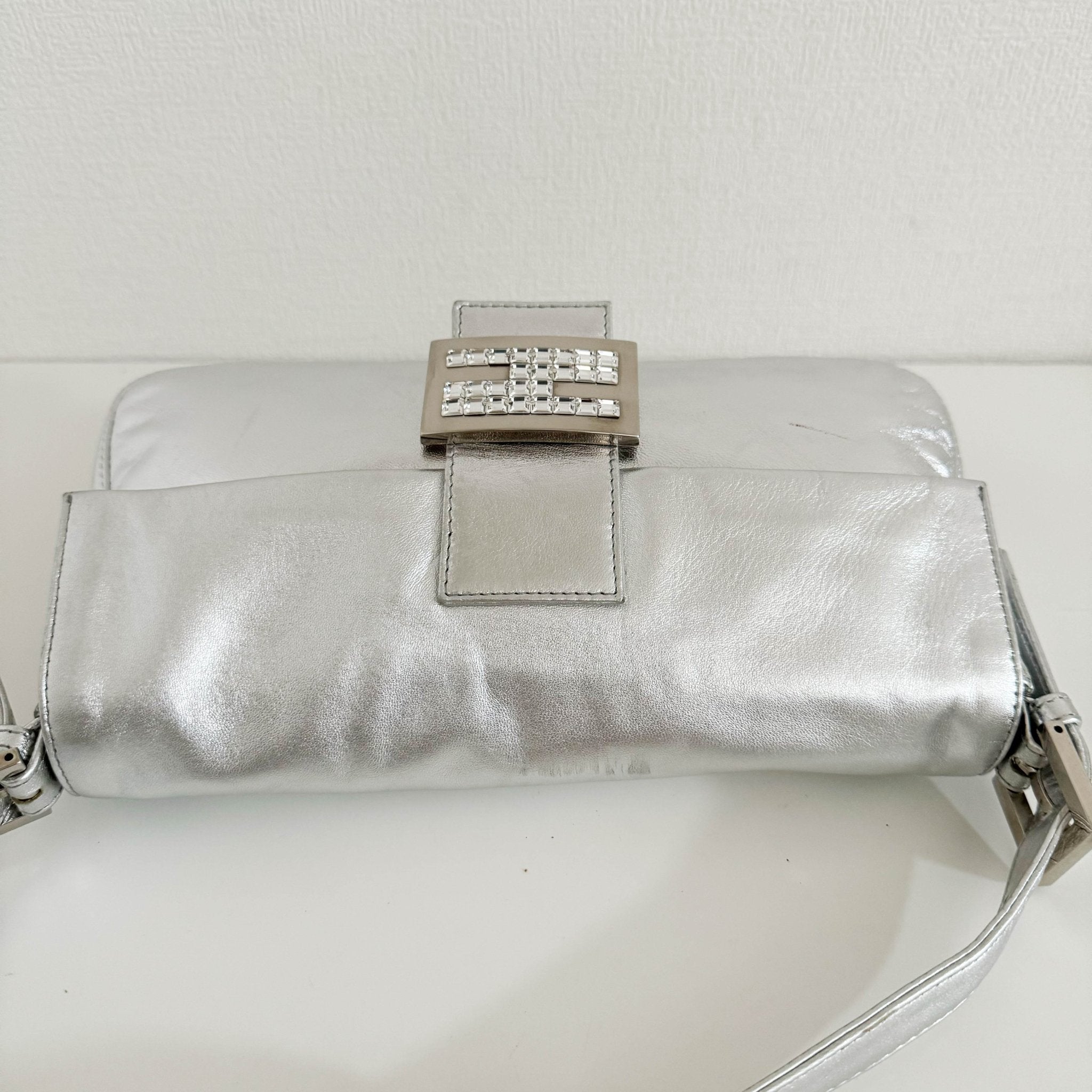 FENDI Baguette Metallic Silver Leather Rhinestone Hardware Shoulder Bag, in , Sold by HIVE PRELOVED - Shoulder Bags, ,