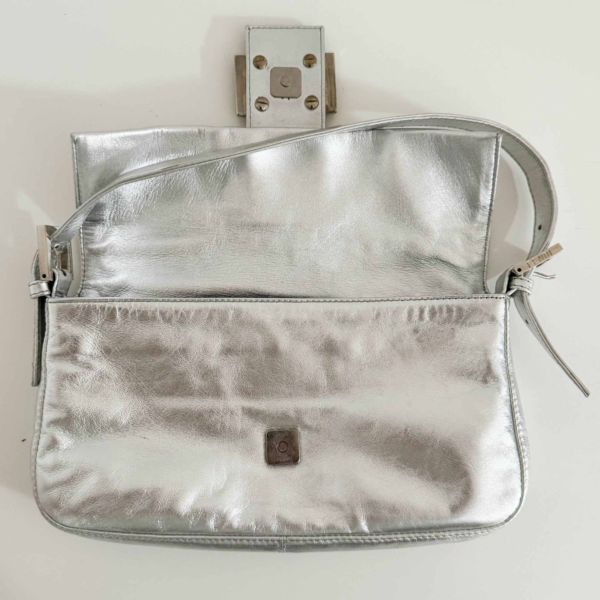 FENDI Baguette Metallic Silver Leather Rhinestone Hardware Shoulder Bag, in , Sold by HIVE PRELOVED - Shoulder Bags, ,
