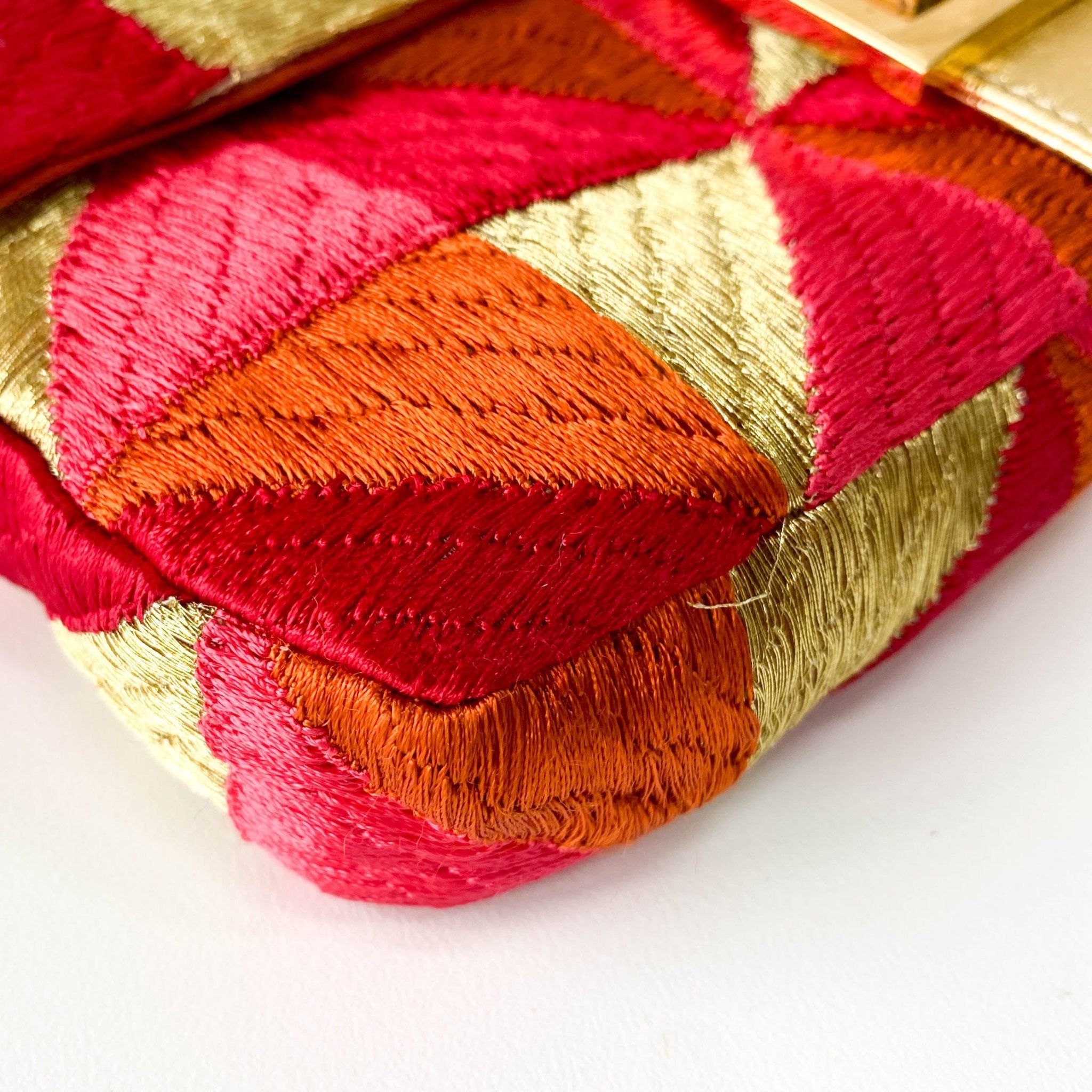 FENDI Baguette Patchwork Gold/ Pink/ Orange/ Red Embroidered Silk Gold Hardware Shoulder Bag, in , Sold by HIVE PRELOVED - Shoulder Bags, ,