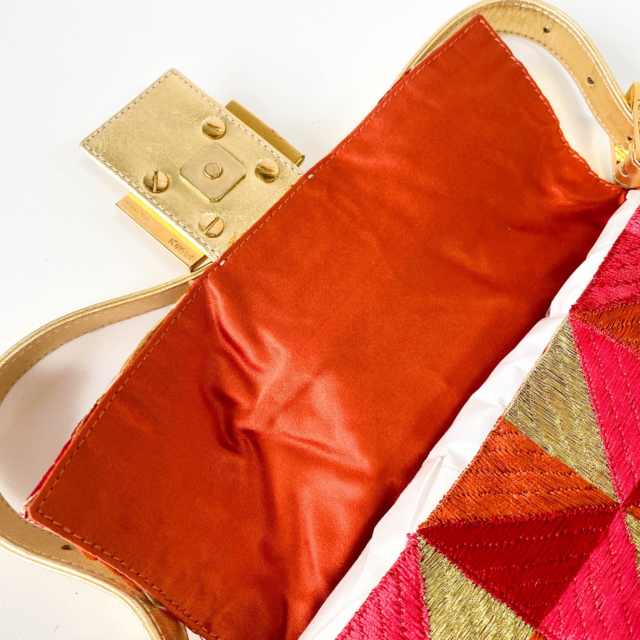 FENDI Baguette Patchwork Gold/ Pink/ Orange/ Red Embroidered Silk Gold Hardware Shoulder Bag, in , Sold by HIVE PRELOVED - Shoulder Bags, ,